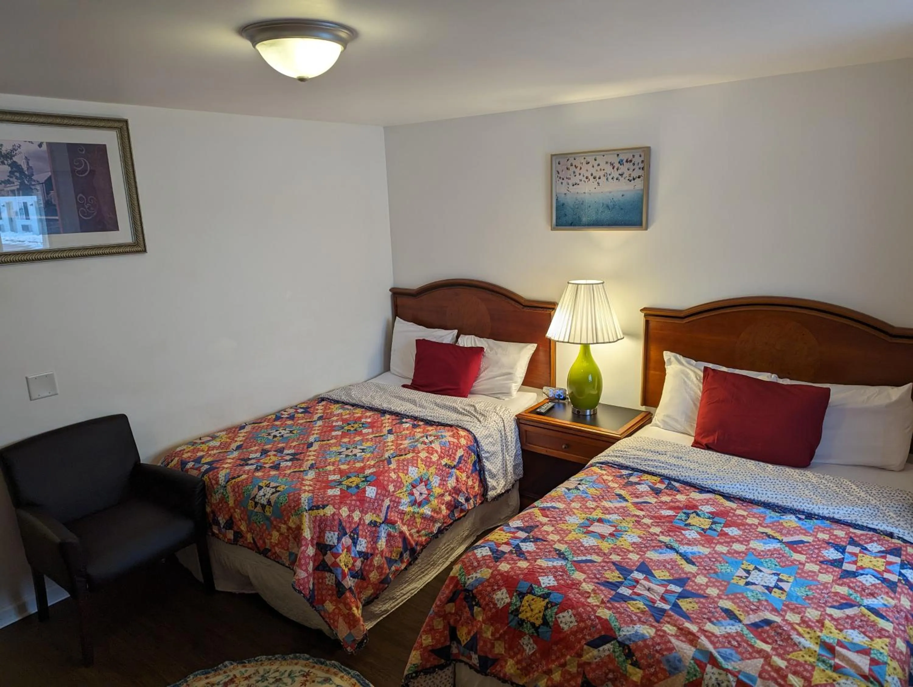 Bed in Apple Inn and Suites Cooperstown Area