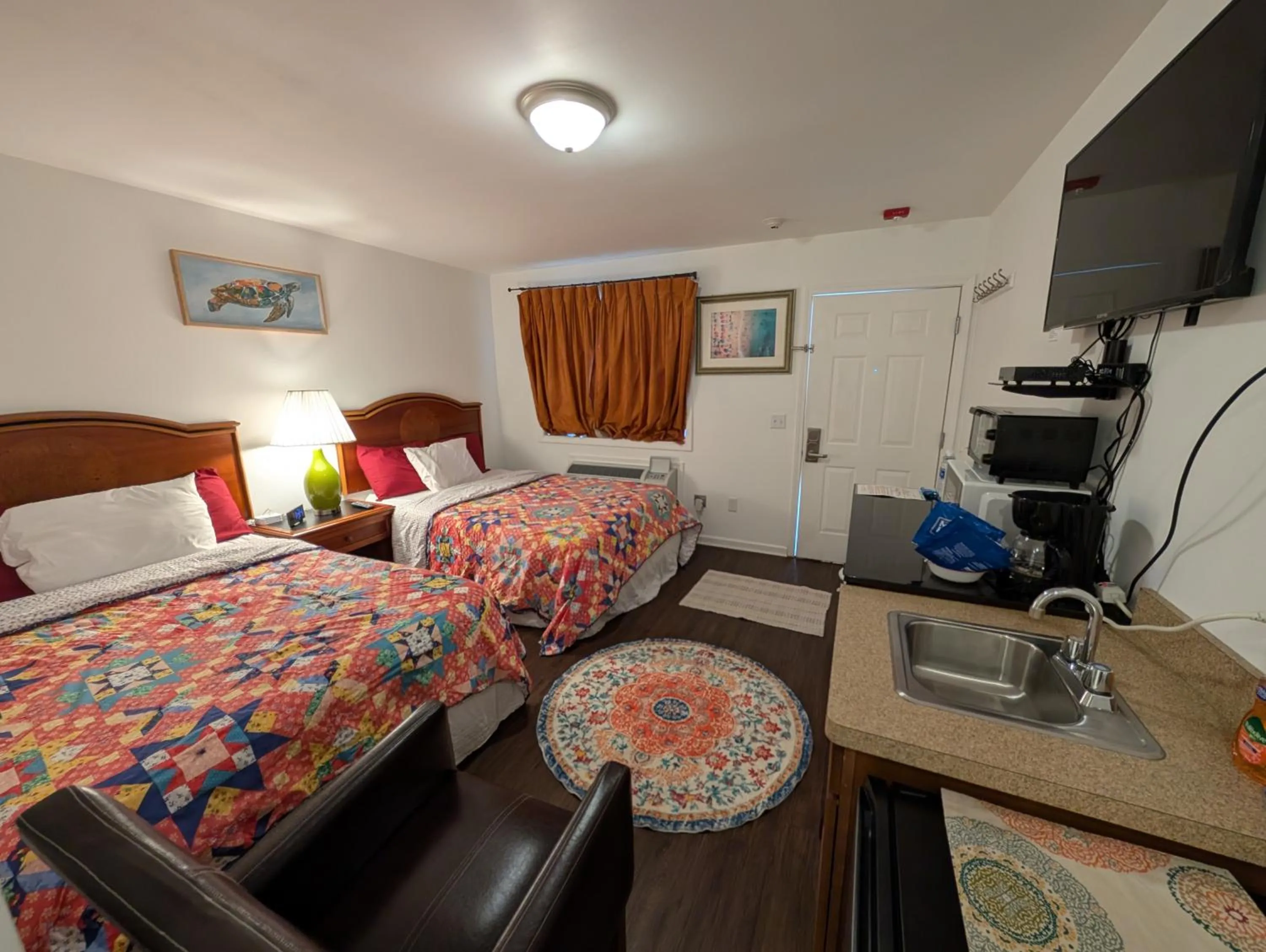 Bed in Apple Inn and Suites Cooperstown Area