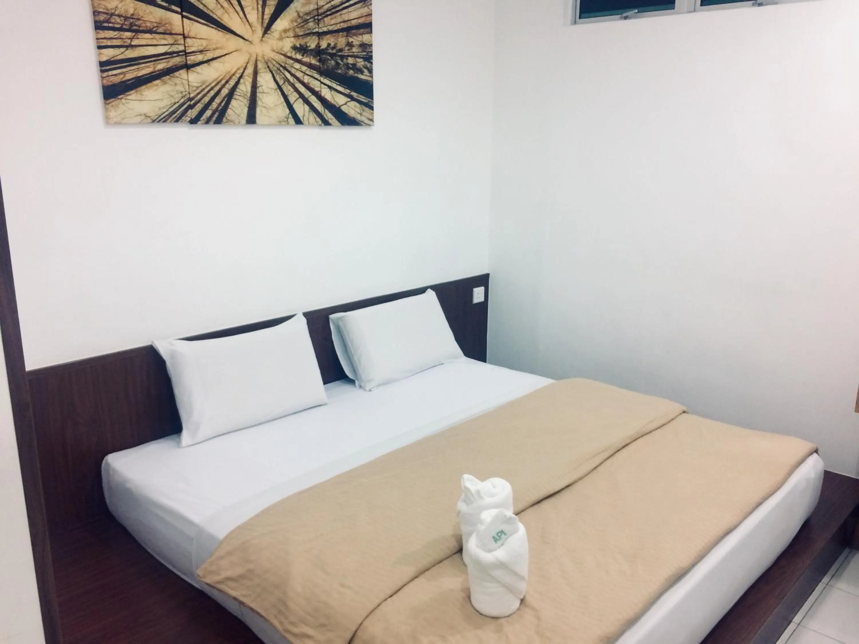 Bed in Api-Api GuestHouse