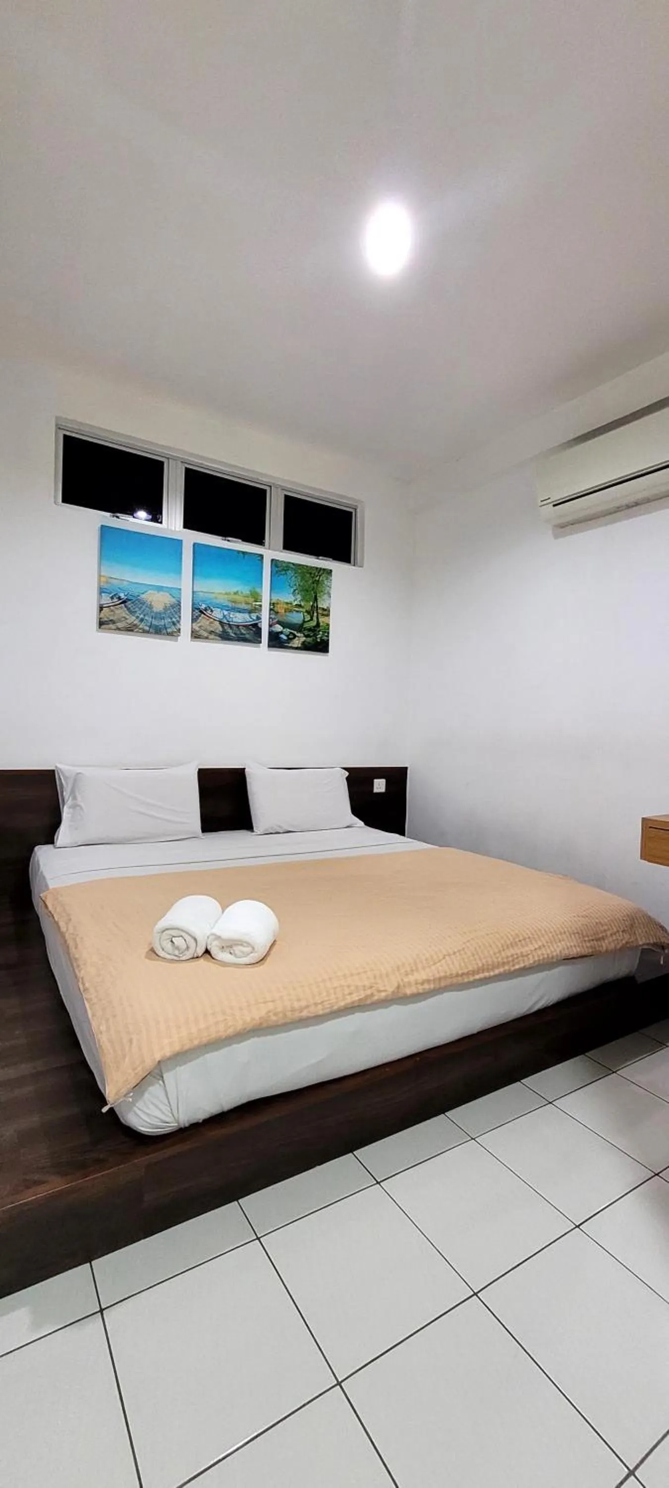 air conditioner, Bed in Api-Api GuestHouse