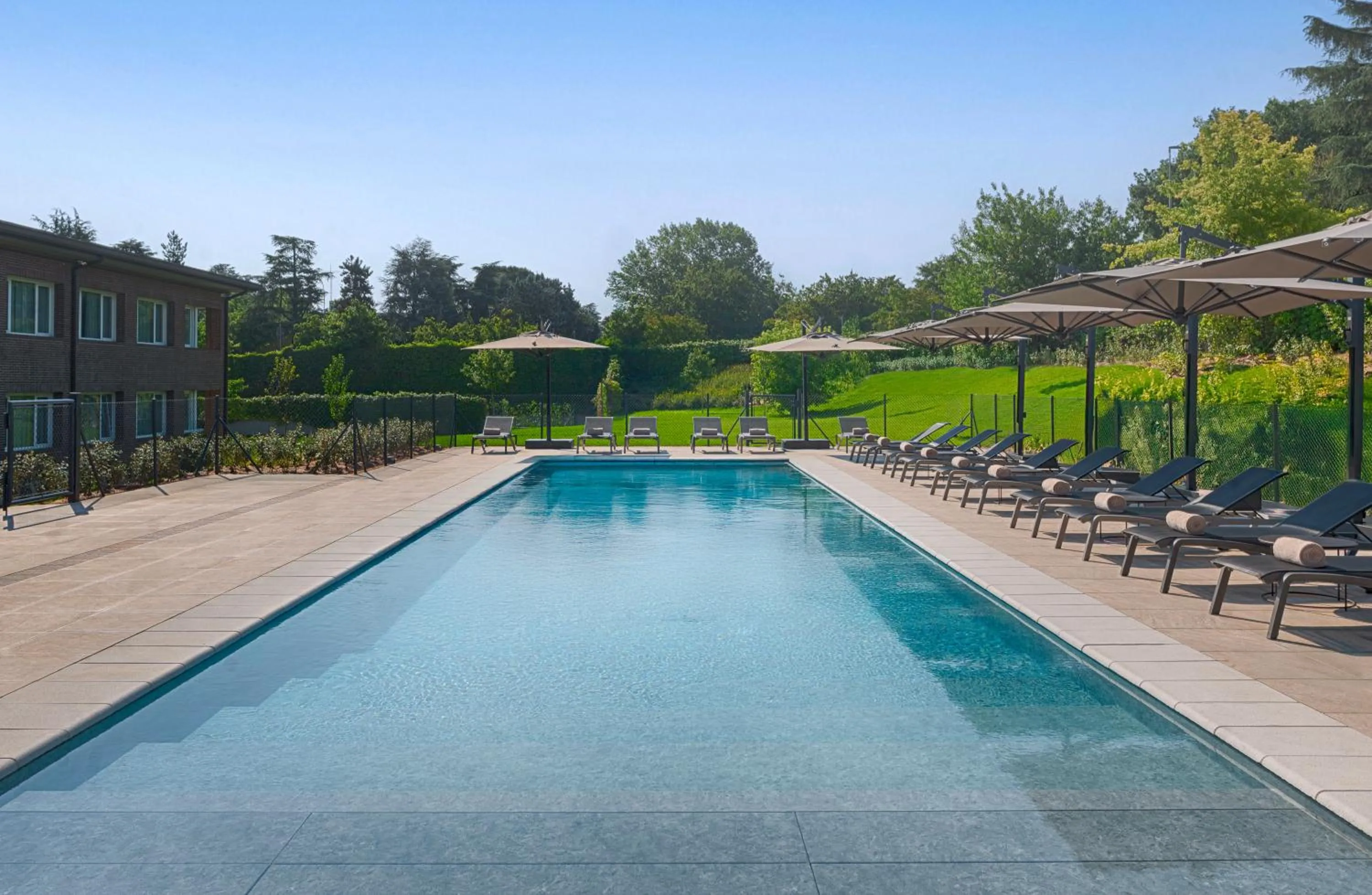 Swimming pool in UNA Hotels Bologna San Lazzaro