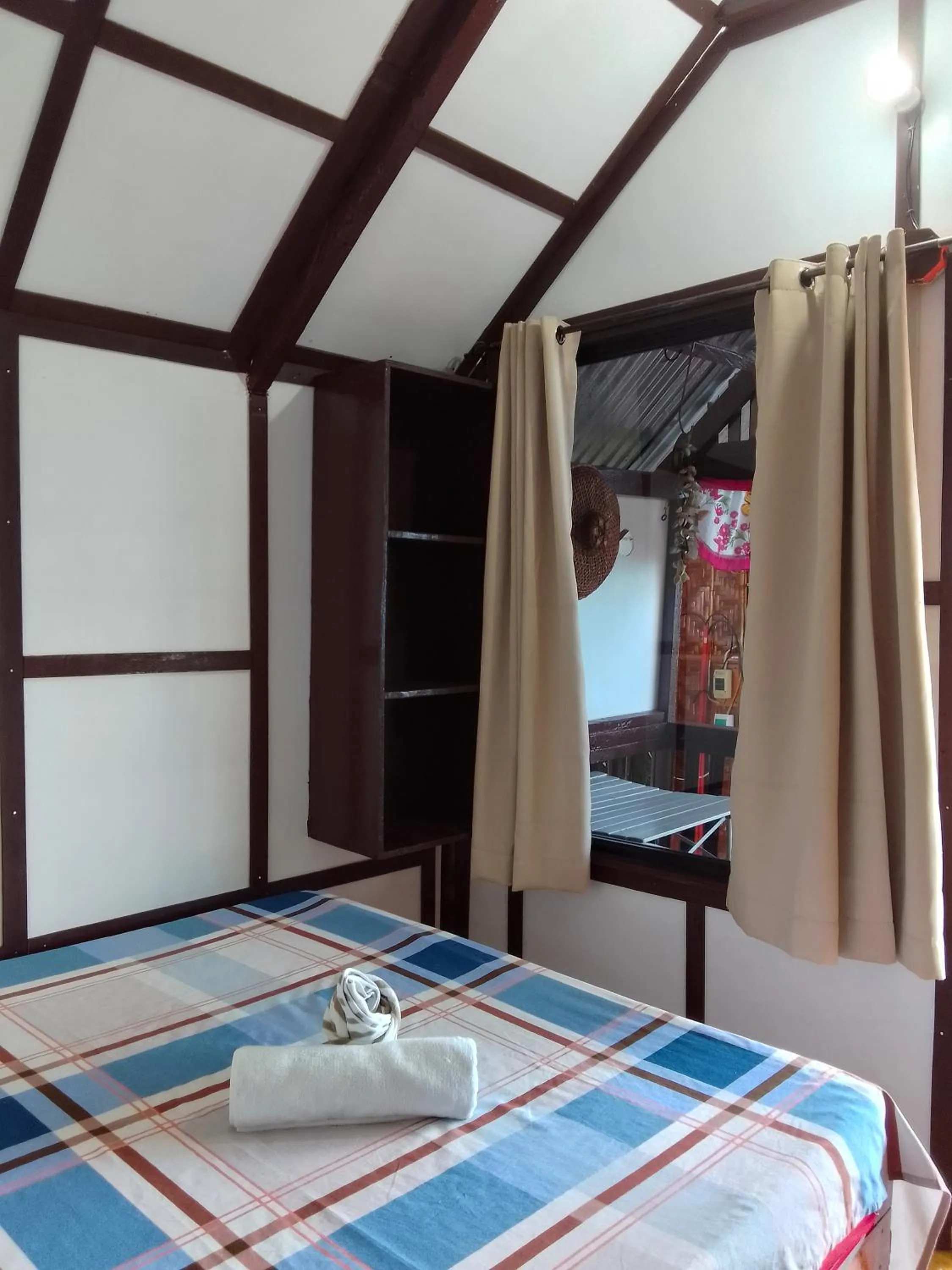 Bed in MLK Bamboo Beachhouse