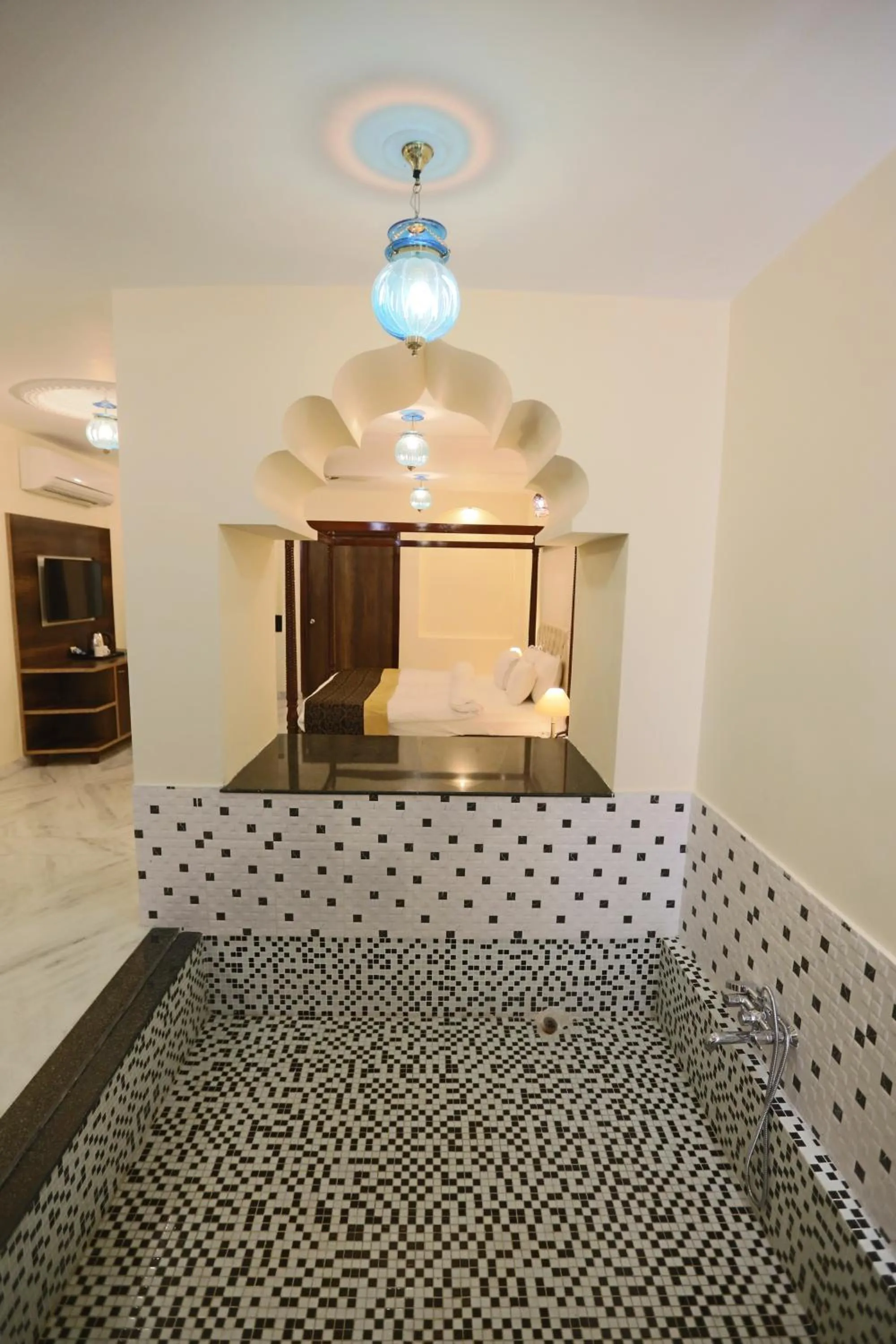 Swimming pool, Bed in Regenta Central Mewargarh, Near Biological park