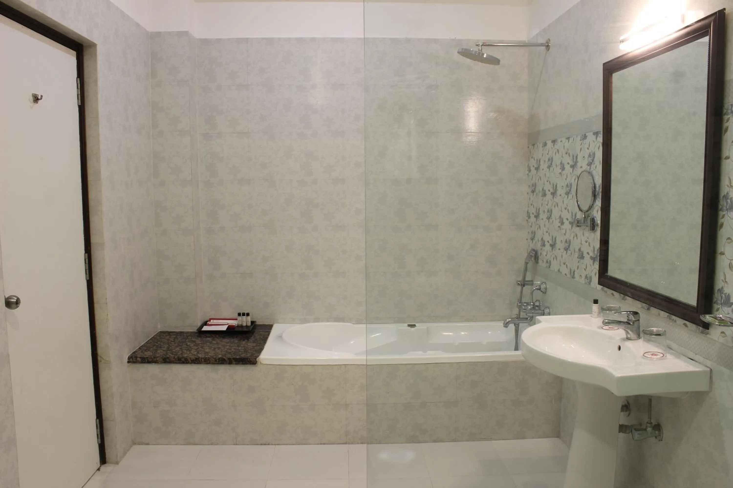 Bathroom in Regenta Central Mewargarh, Near Biological park