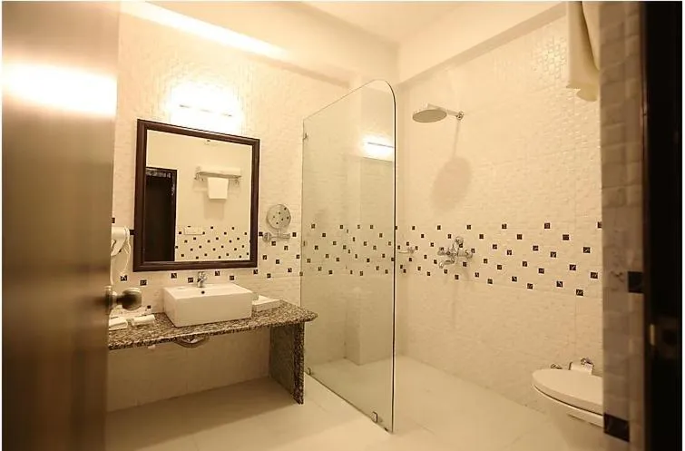 Toilet in Regenta Central Mewargarh, Near Biological park