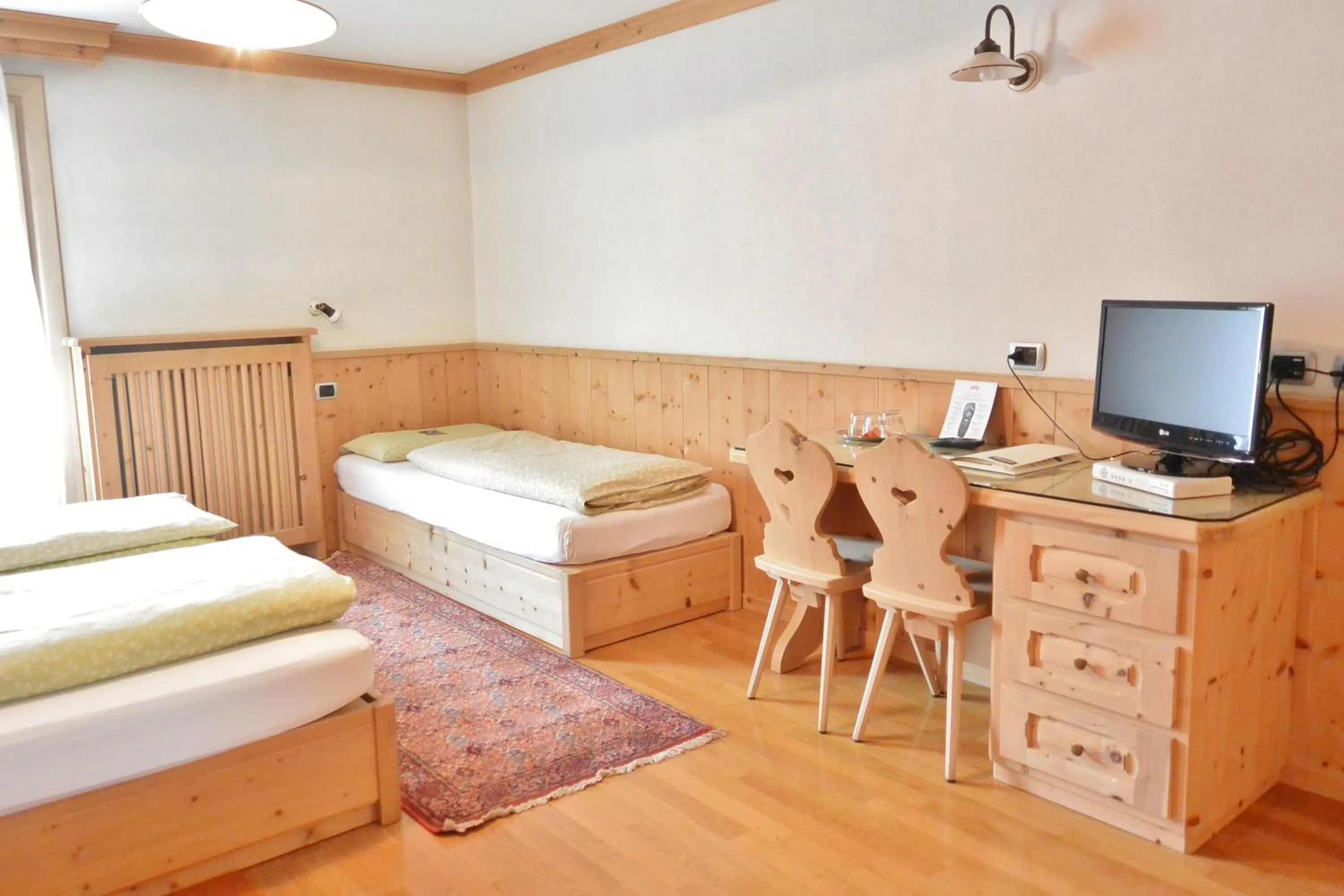 Bed in Hotel Garnì al Plan