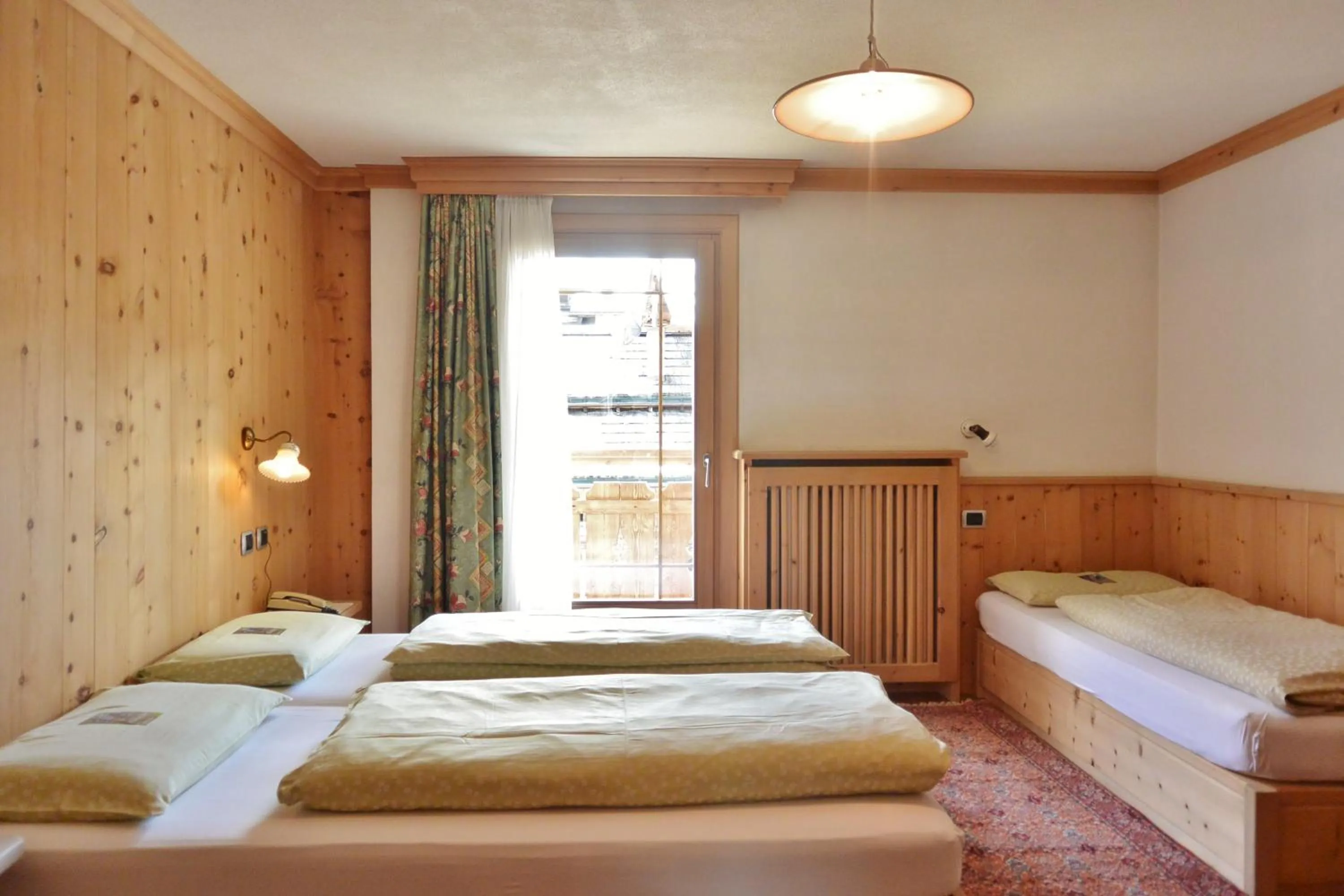 Bed in Hotel Garnì al Plan