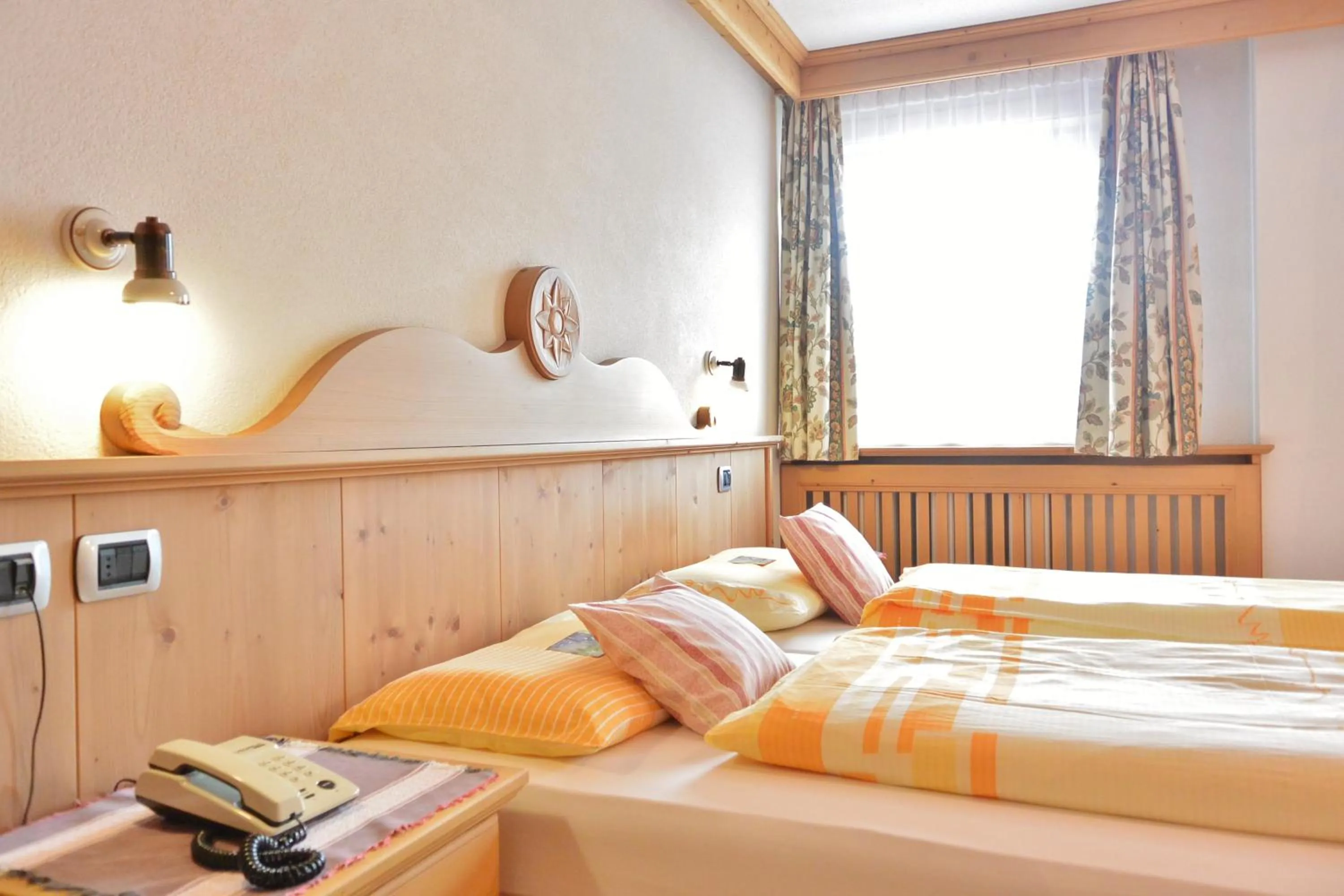 Bed in Hotel Garnì al Plan