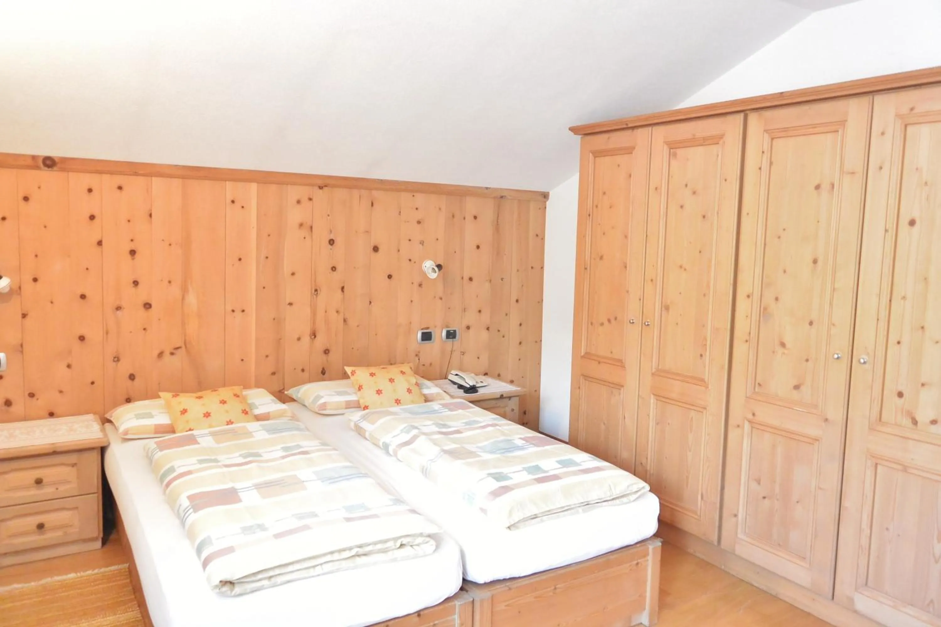 Bed in Hotel Garnì al Plan