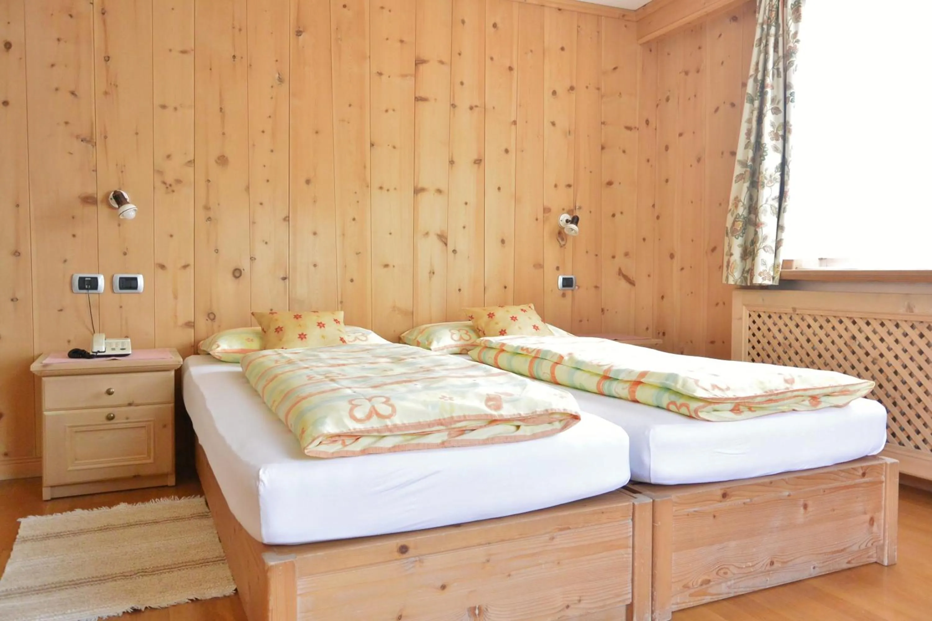 Bed in Hotel Garnì al Plan