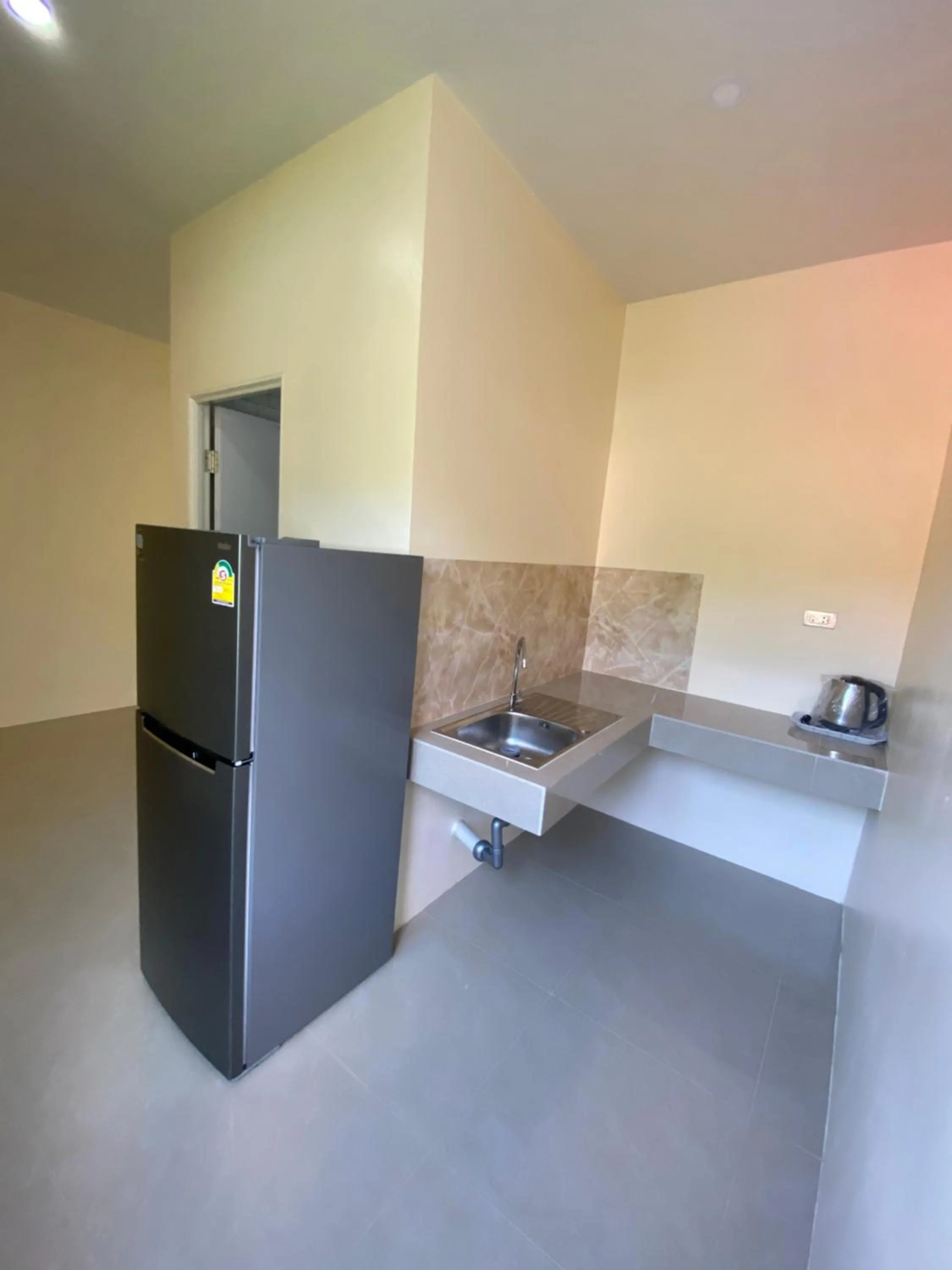 Kitchen or kitchenette in Budchui Guesthouse