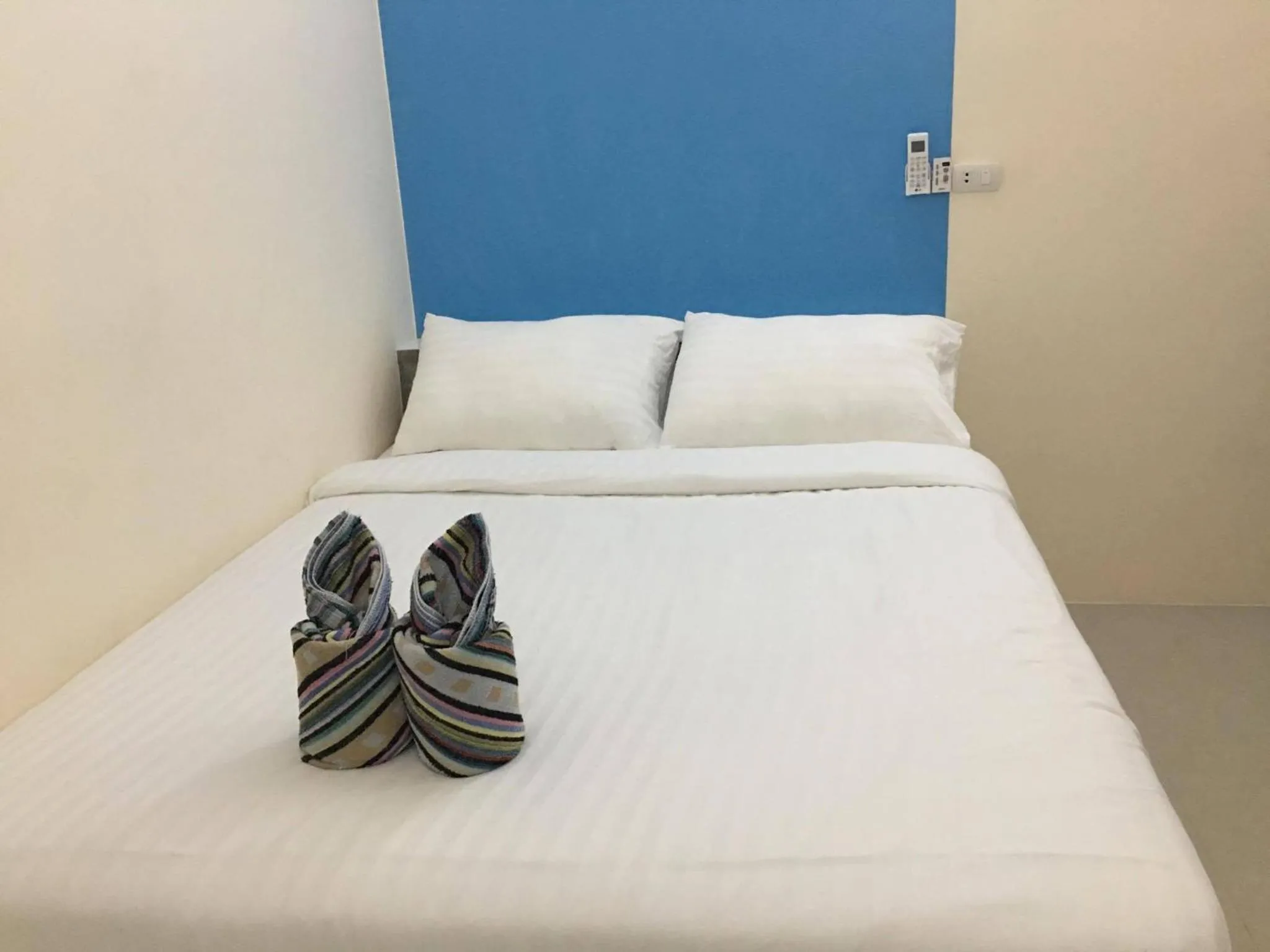 Bed in Budchui Guesthouse