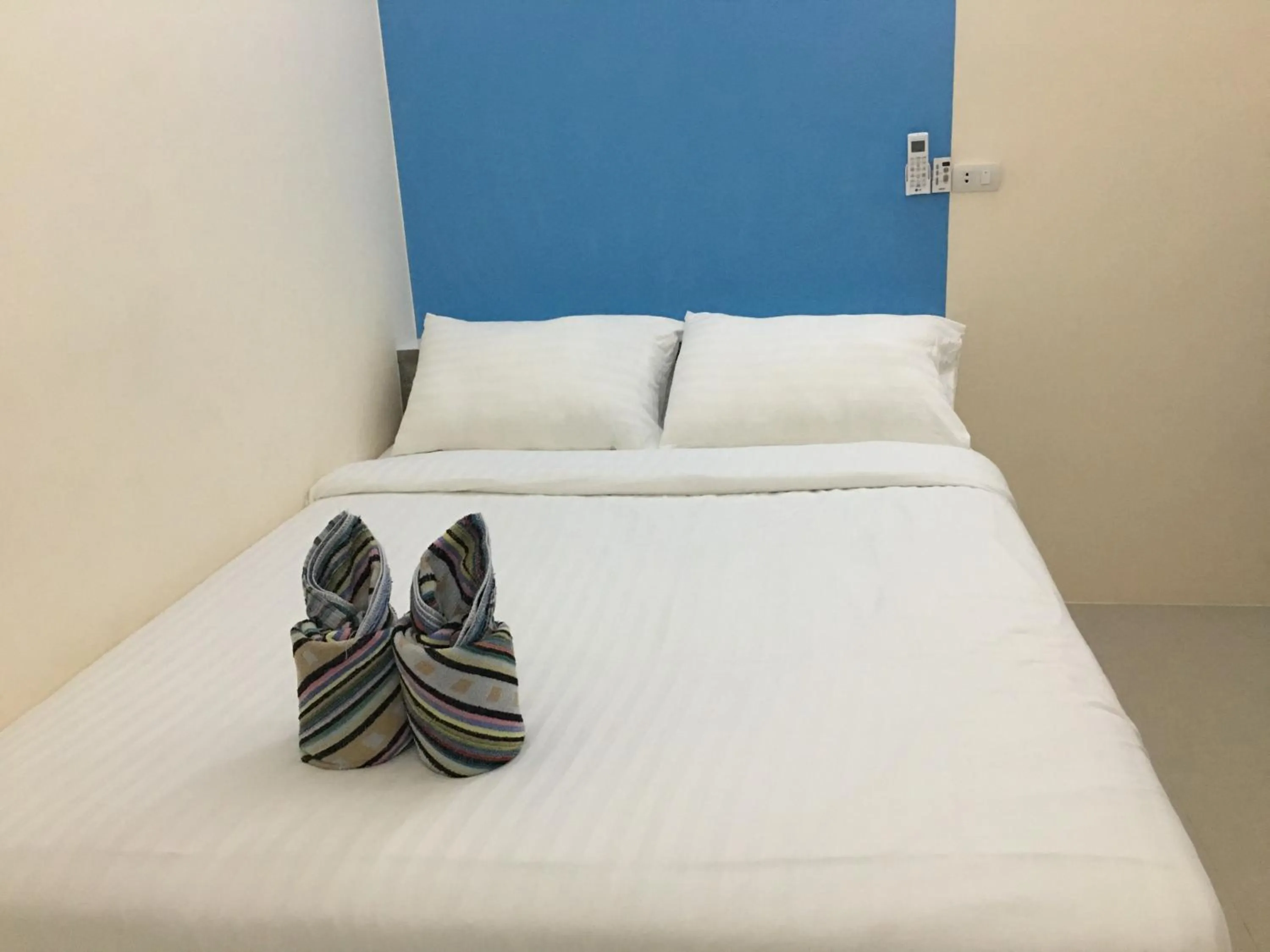 Bed in Budchui Guesthouse