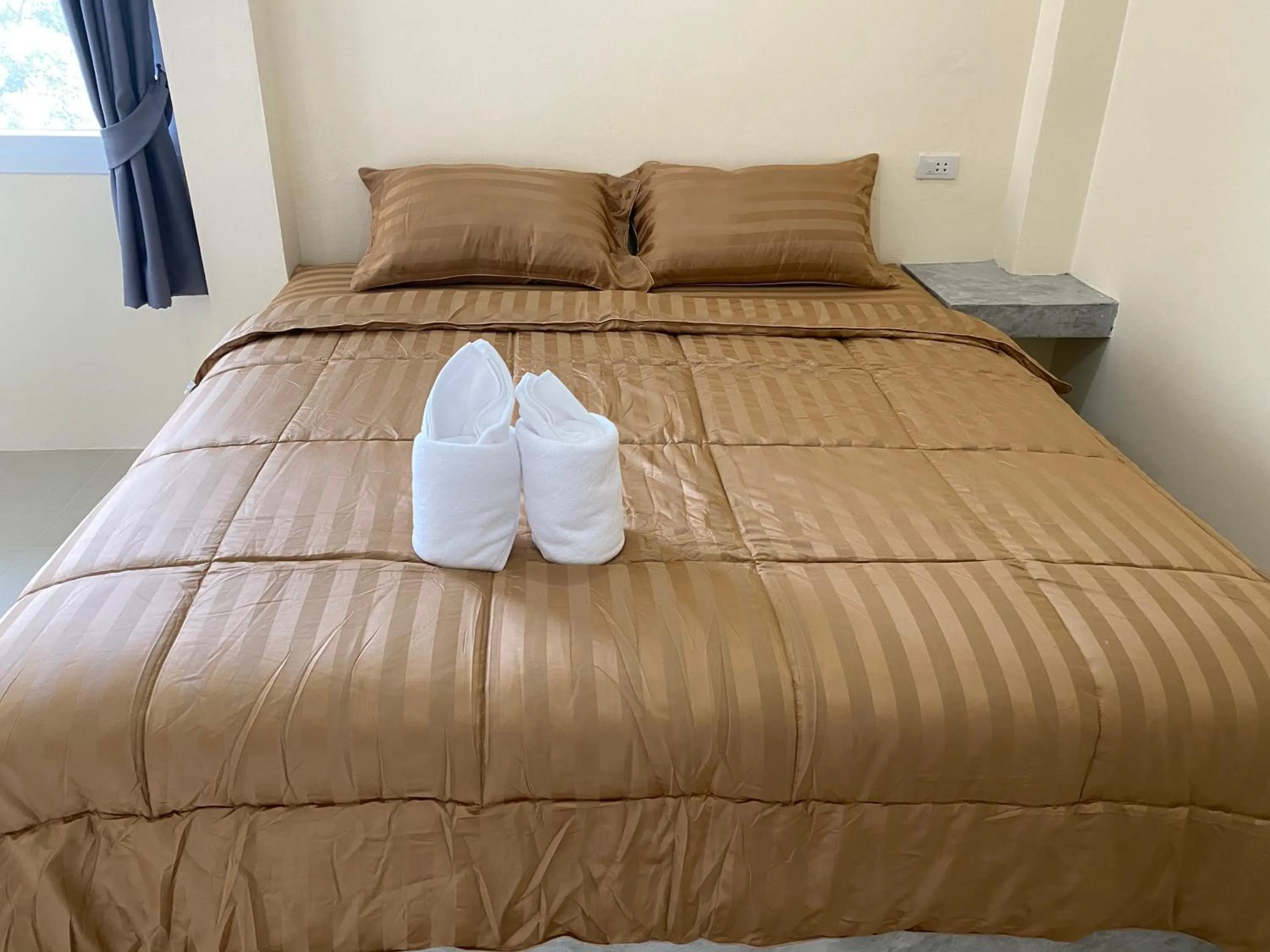 Bed in Budchui Guesthouse