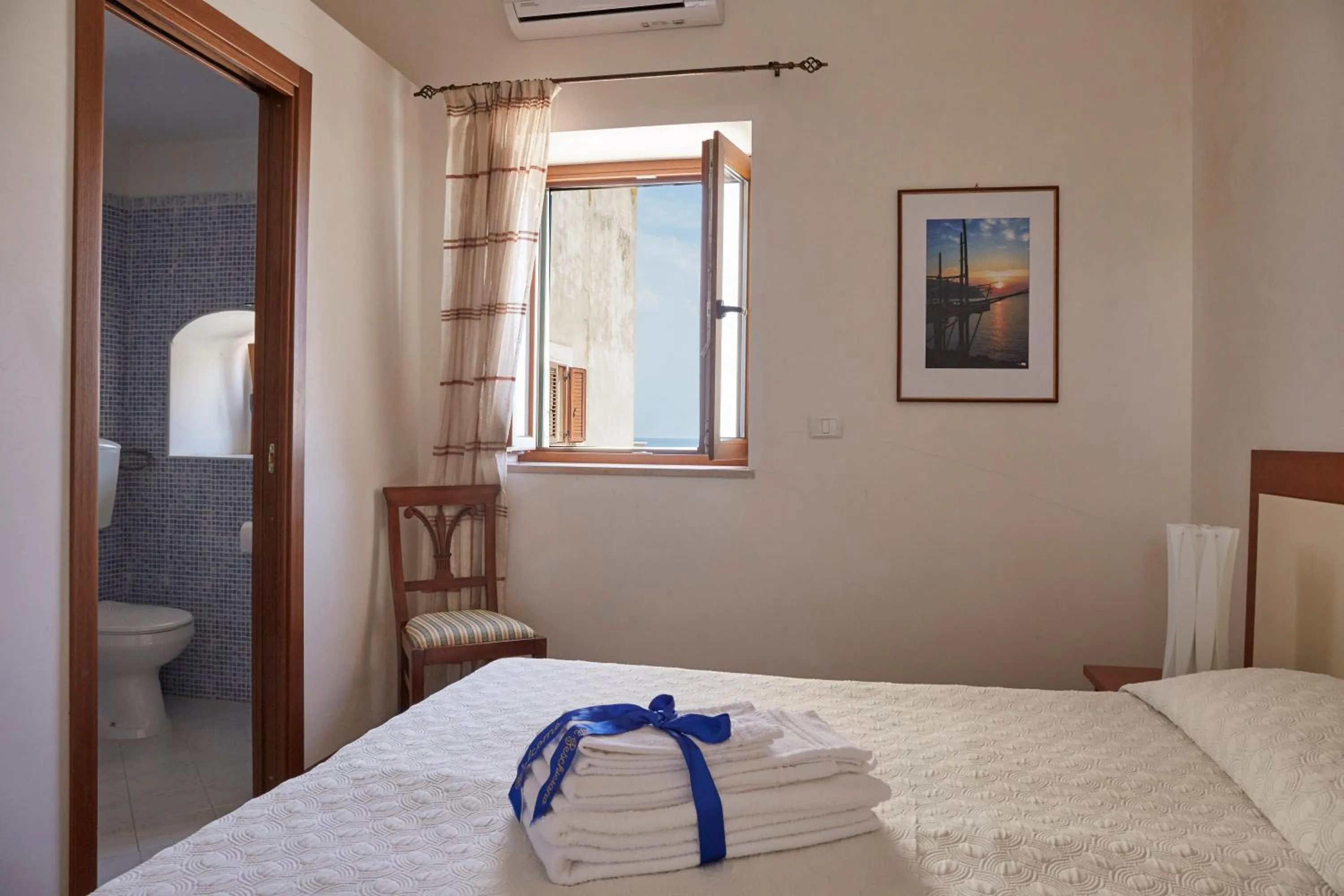 Photo of the whole room, Bed in Il Peschiciano