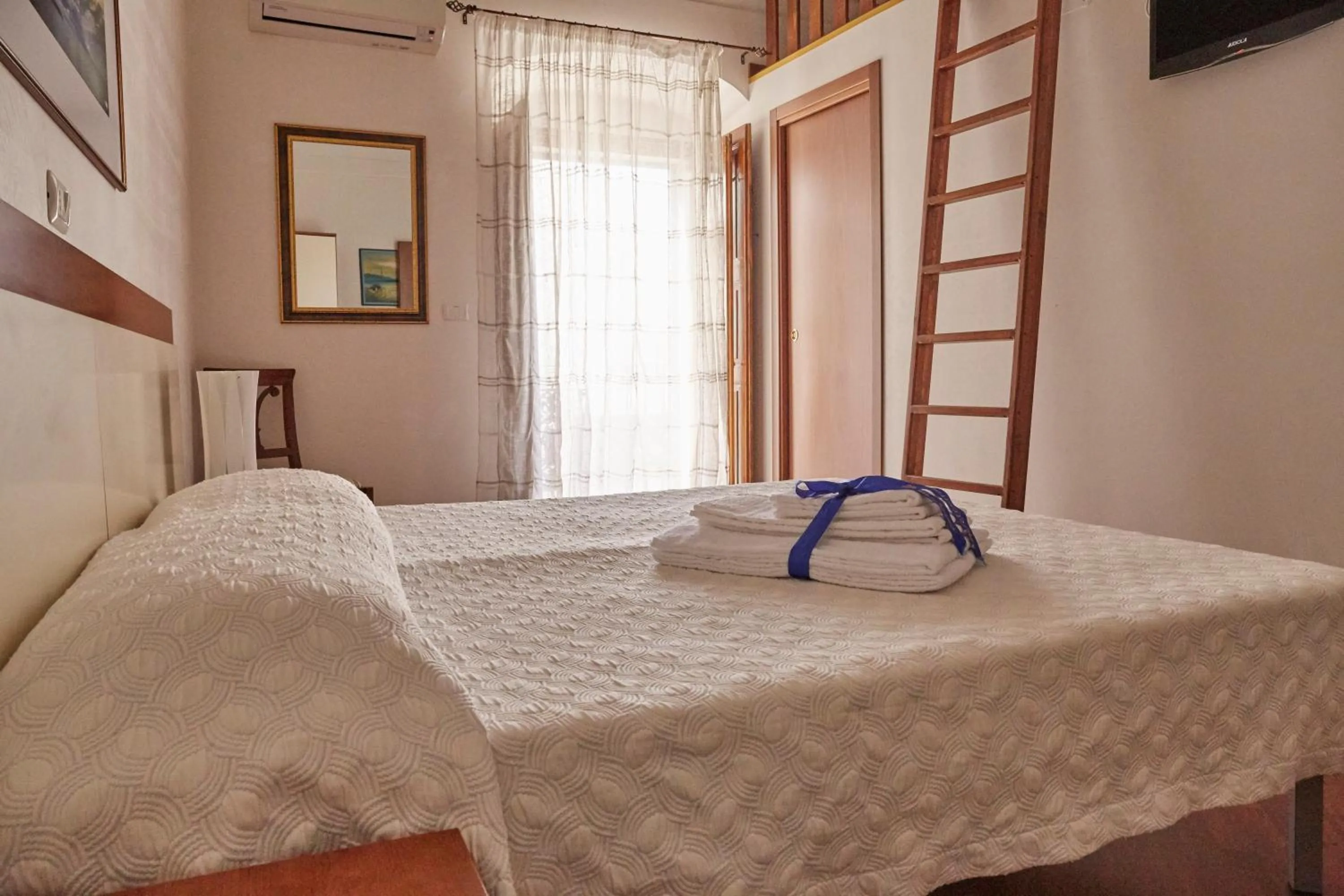 Photo of the whole room, Bed in Il Peschiciano