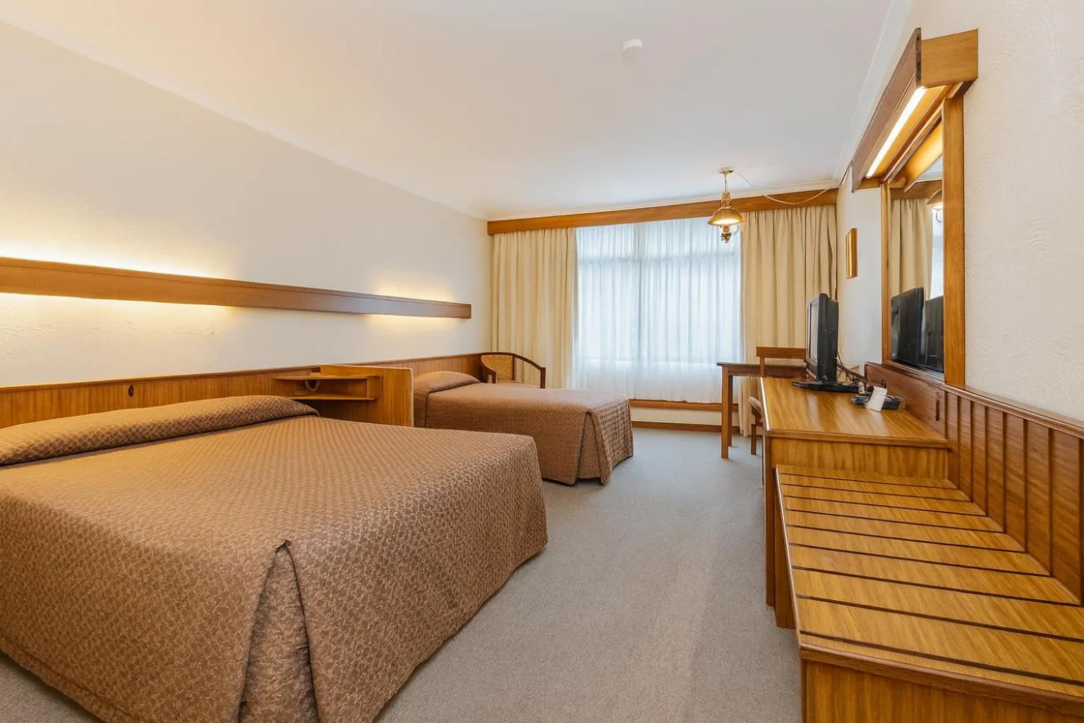 Bed in West Coaster Motel