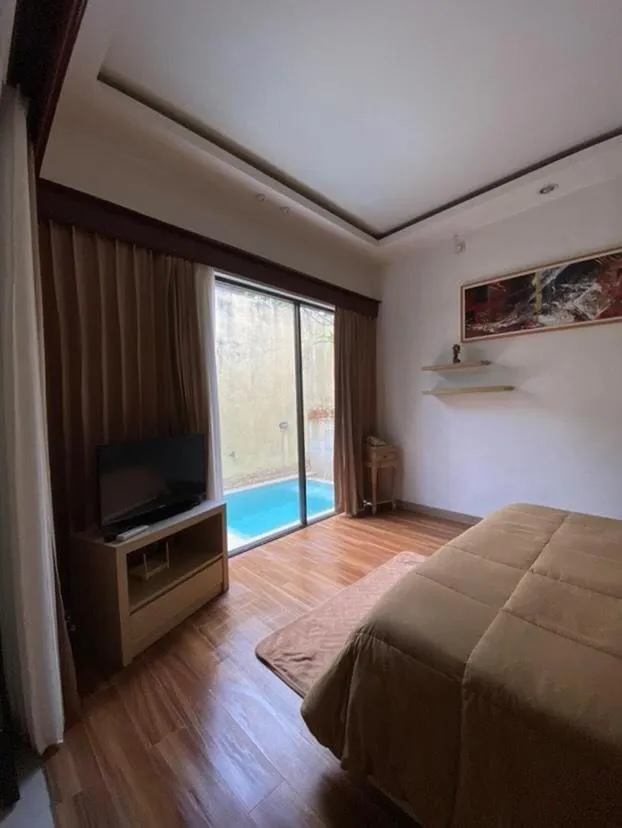 TV and multimedia, Bed in Muaya Villa