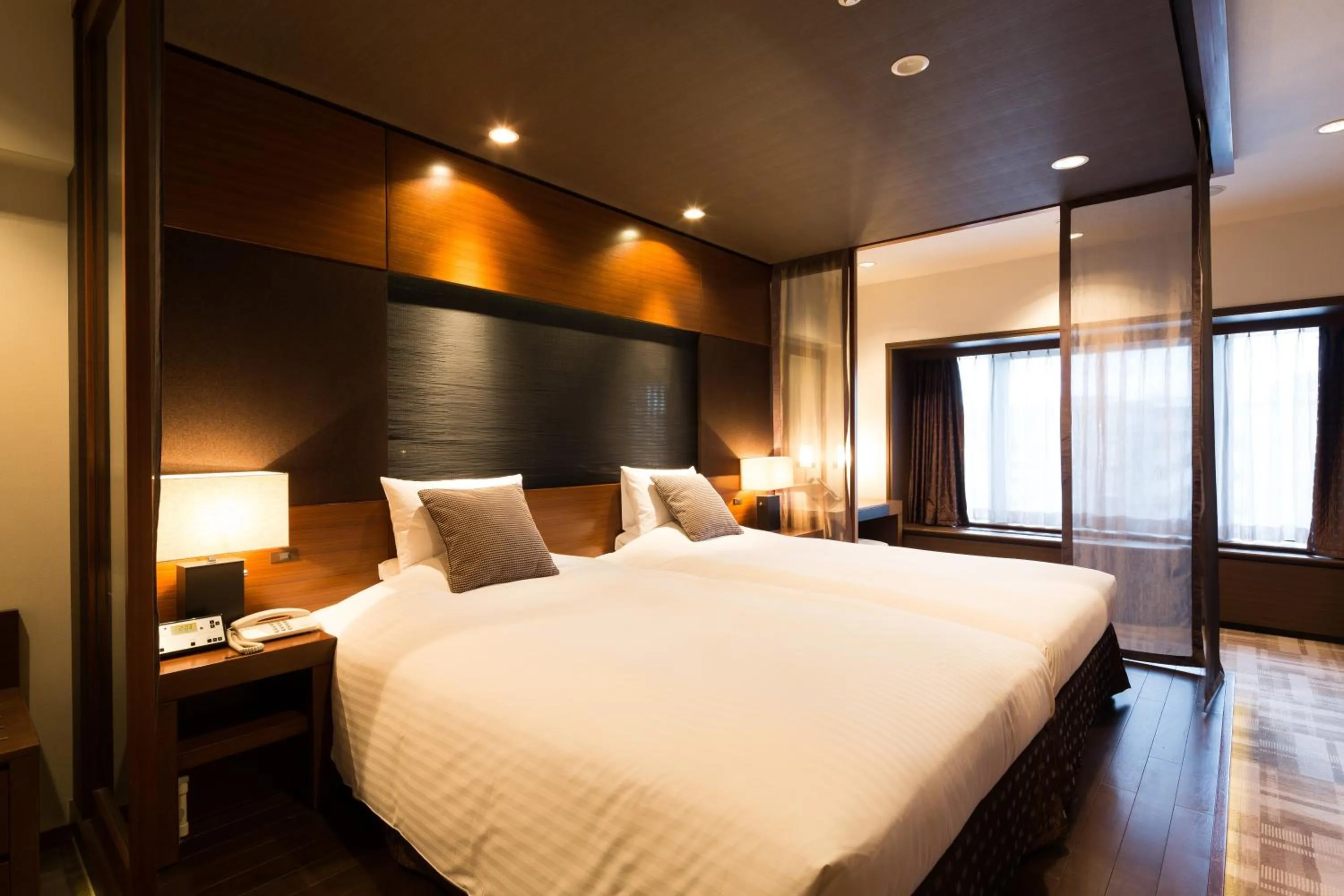 Bed in Kyoto Brighton Hotel