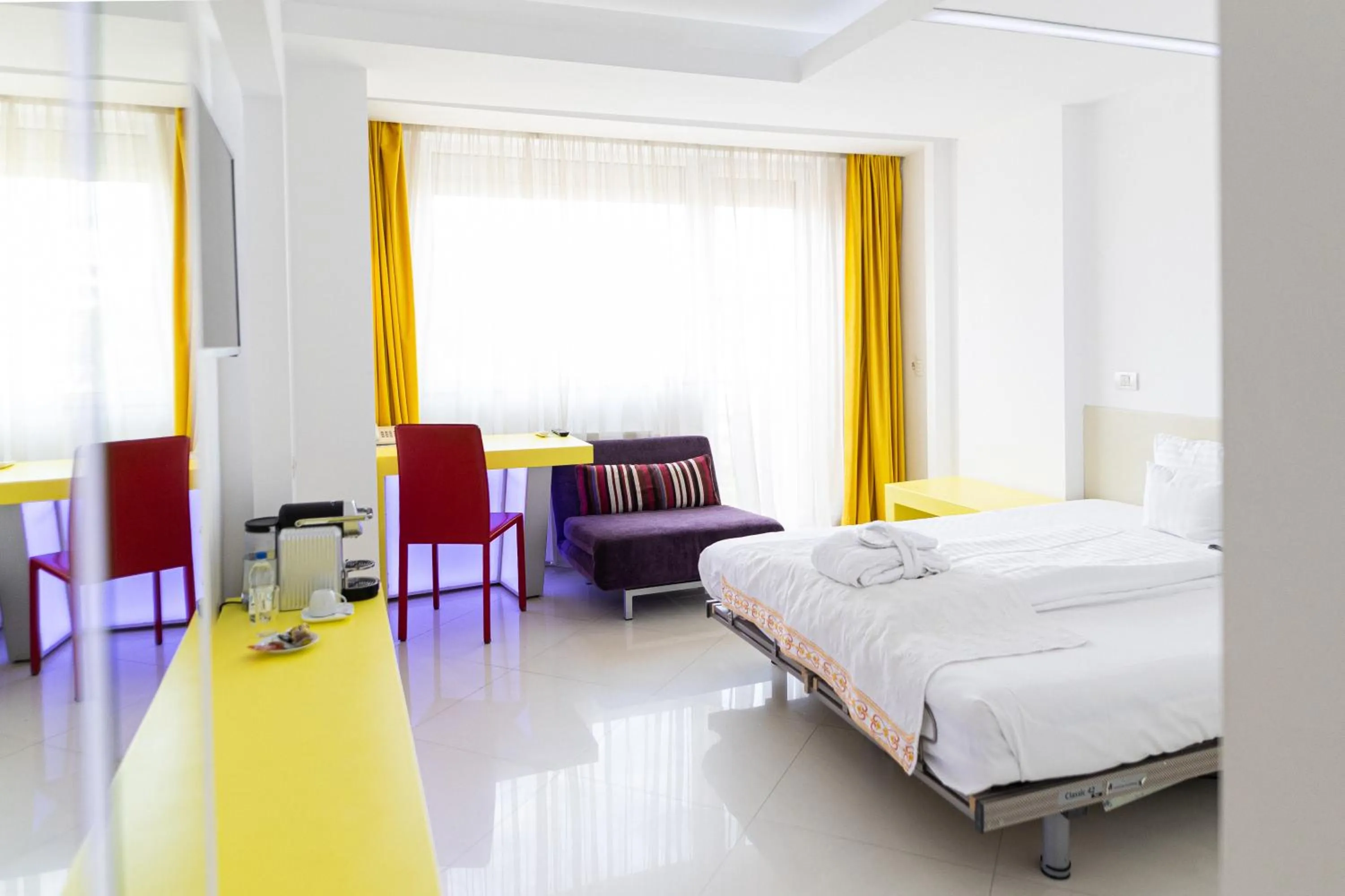 Bed in Christina Hotel