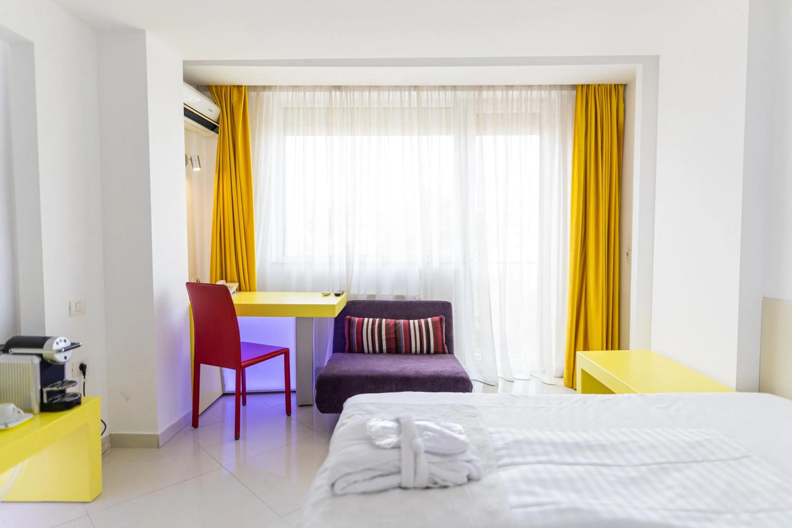 Bed in Christina Hotel