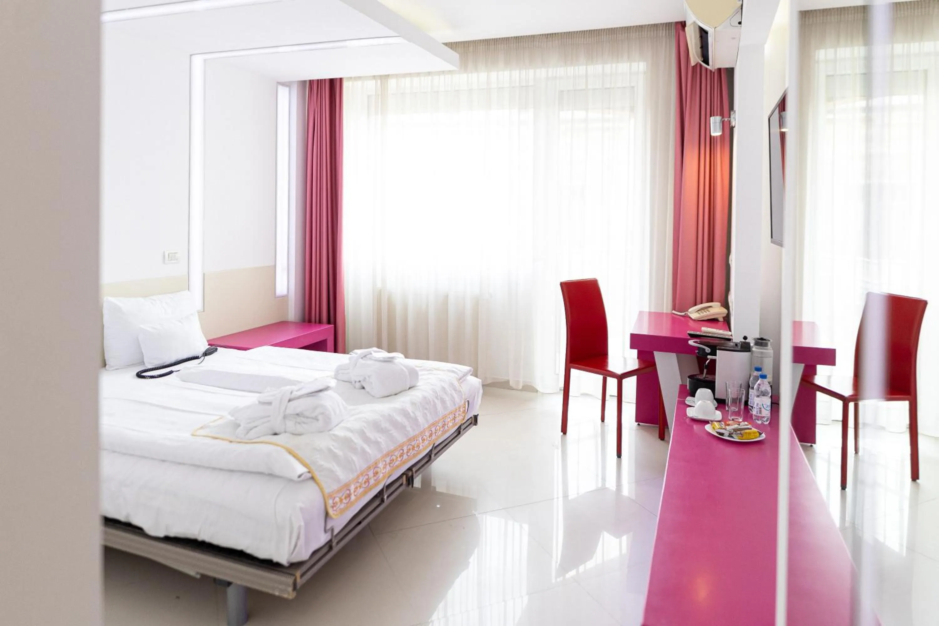 Bed in Christina Hotel