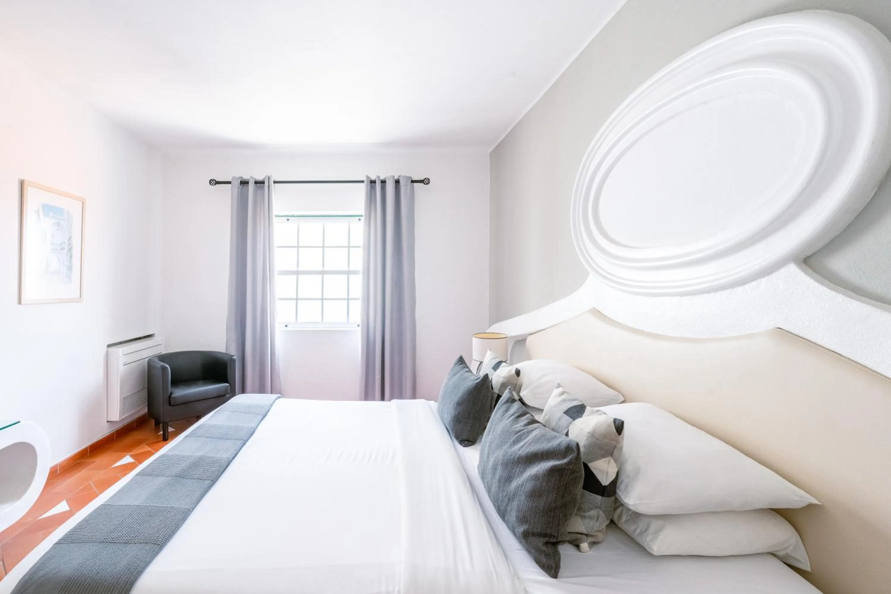 Bed in Baluarte da Vila Apartments