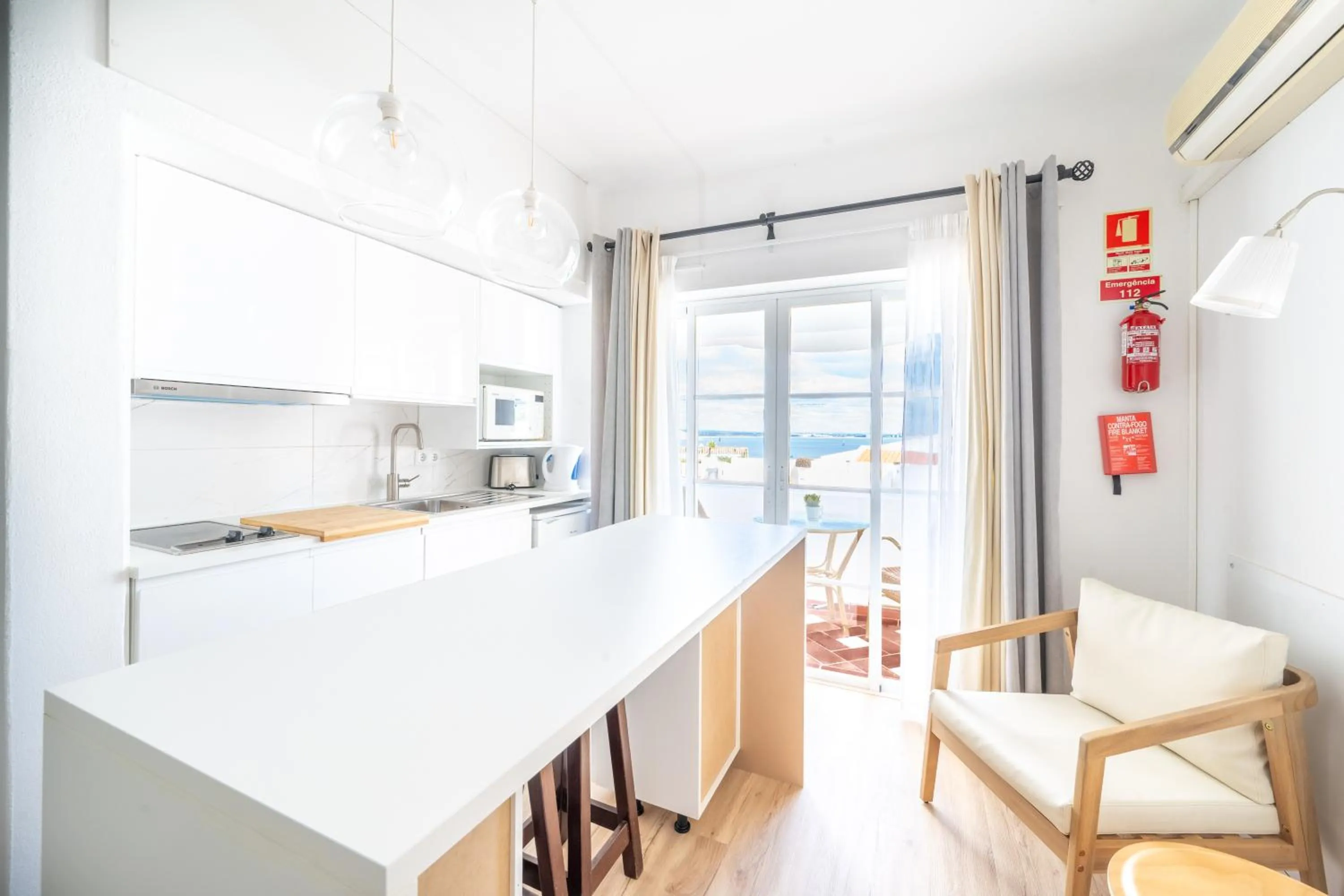 Kitchen or kitchenette in Baluarte da Vila Apartments