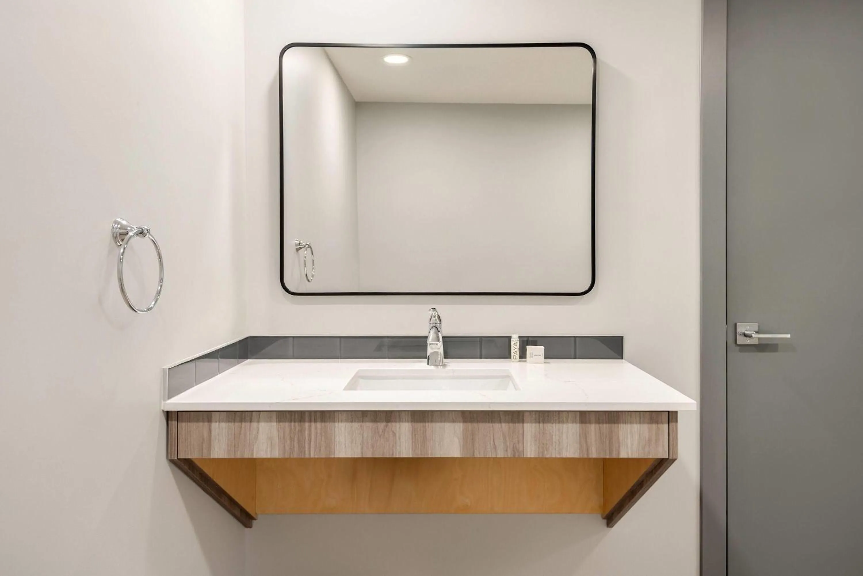 Shower in Ramada by Wyndham West Edmonton Hotel & Suites