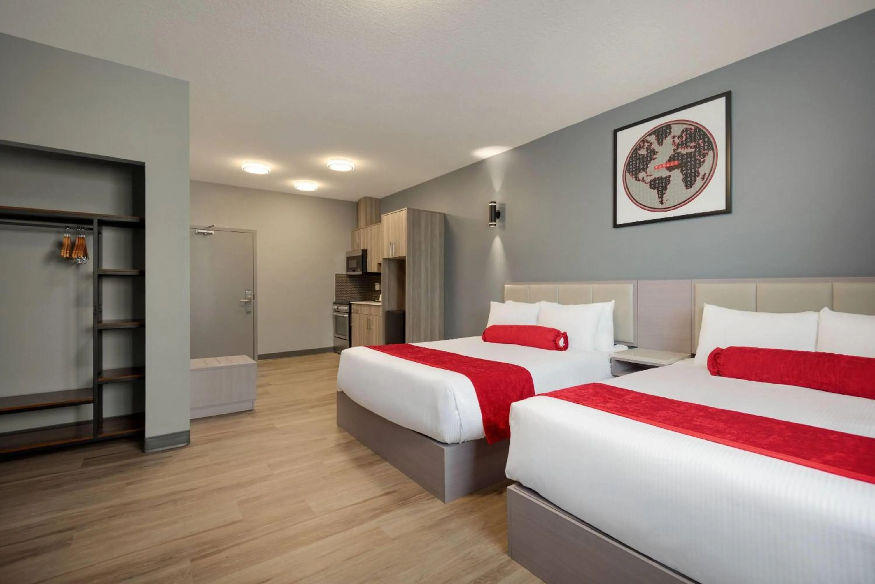 Photo of the whole room, Bed in Ramada by Wyndham West Edmonton Hotel & Suites