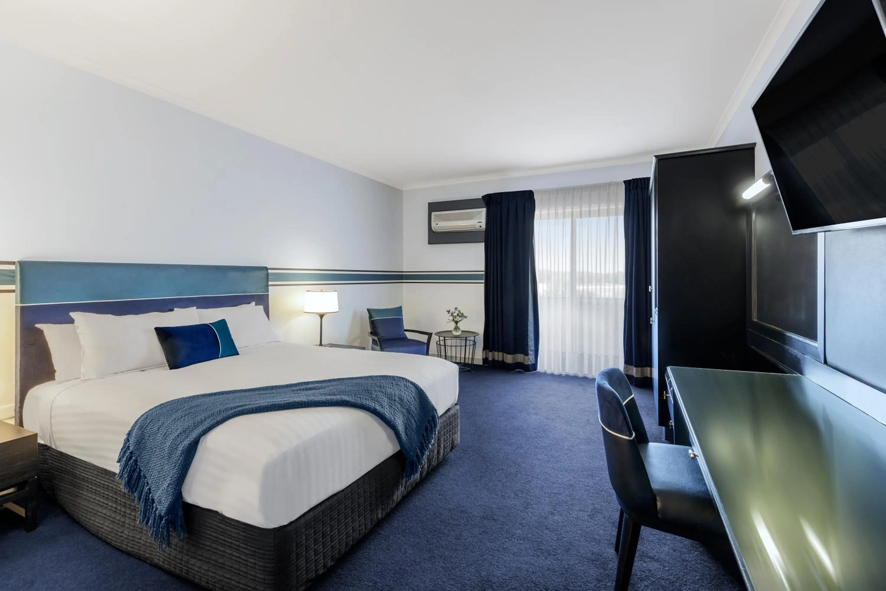 Bed in Ramada by Wyndham Diplomat Canberra