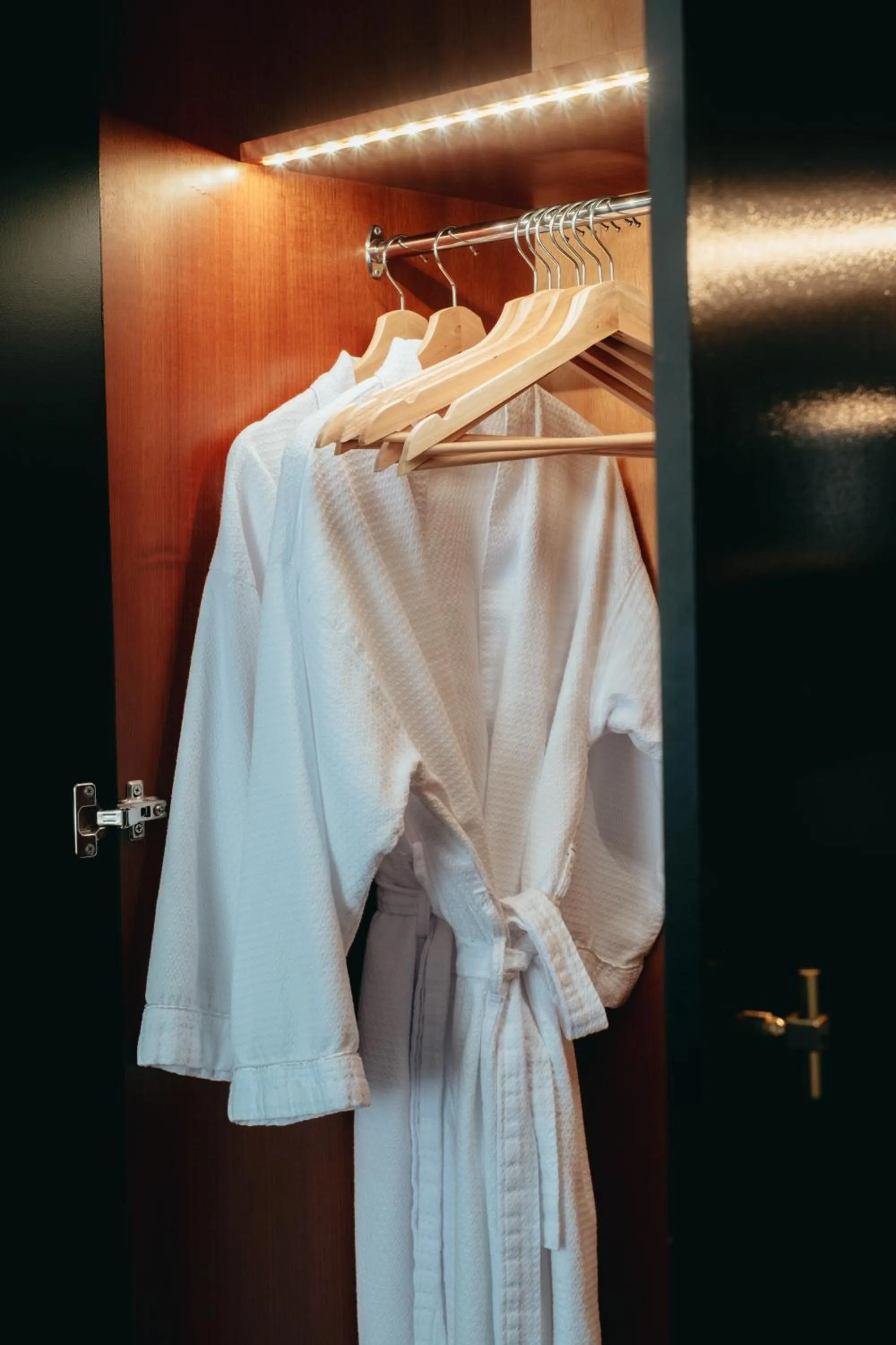 wardrobe in Ramada by Wyndham Diplomat Canberra
