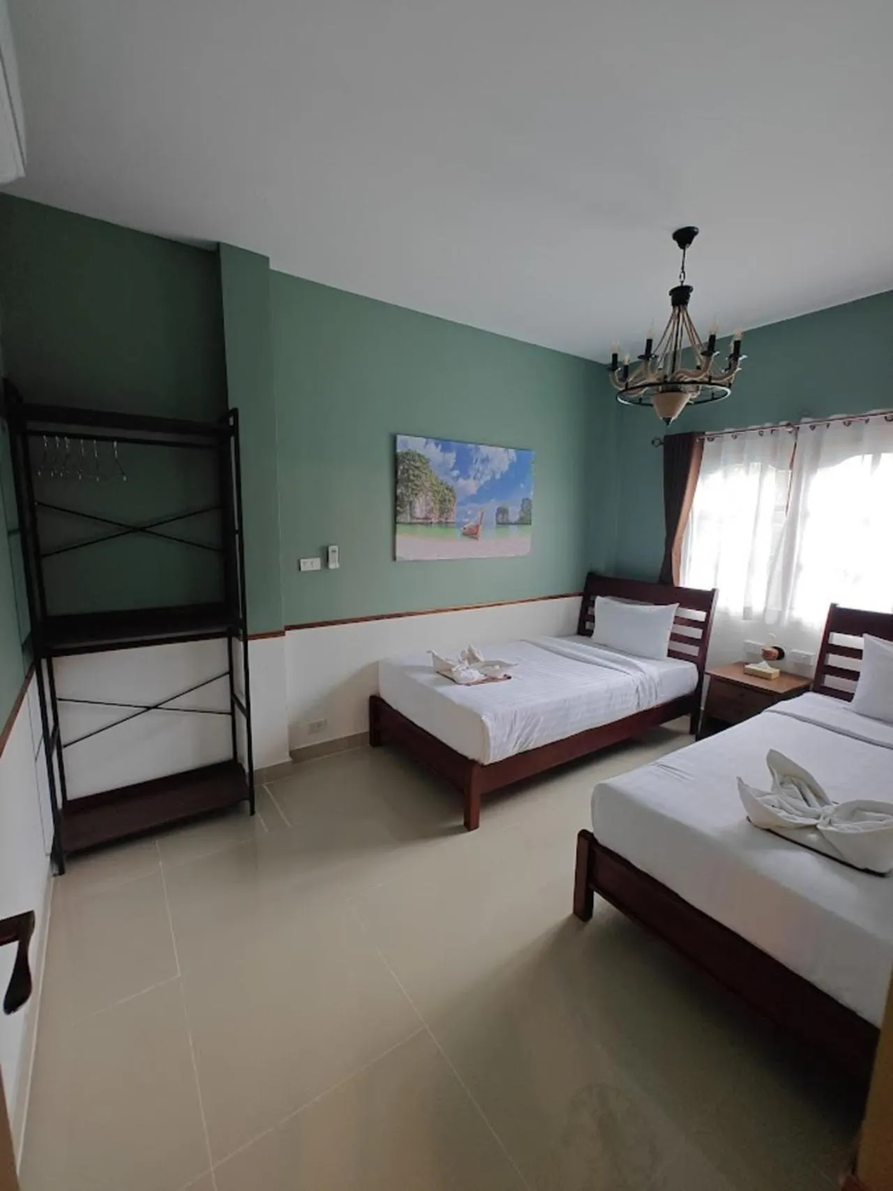 Bed in Namphung Phuket Boutique Resort