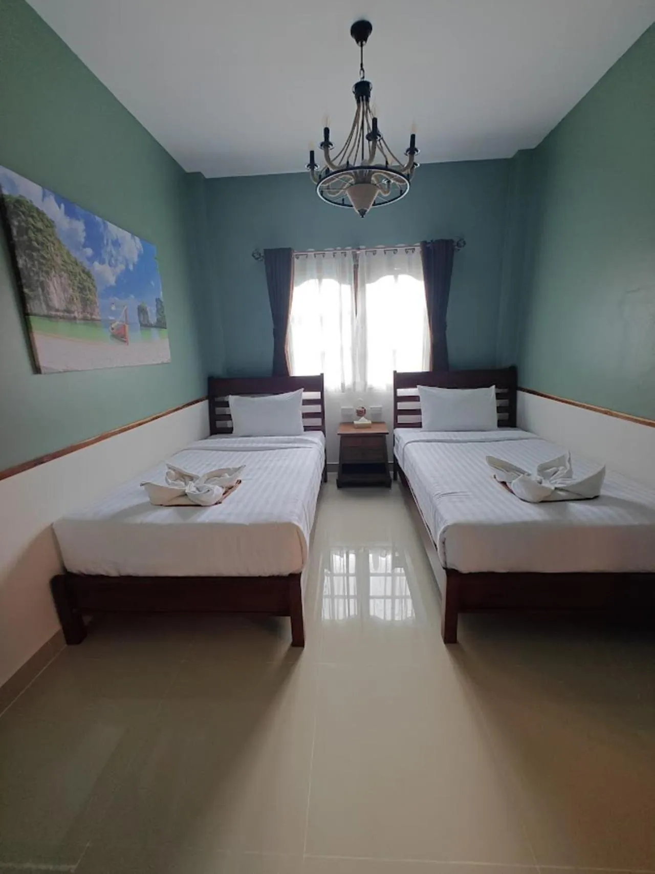 Bed in Namphung Phuket Boutique Resort
