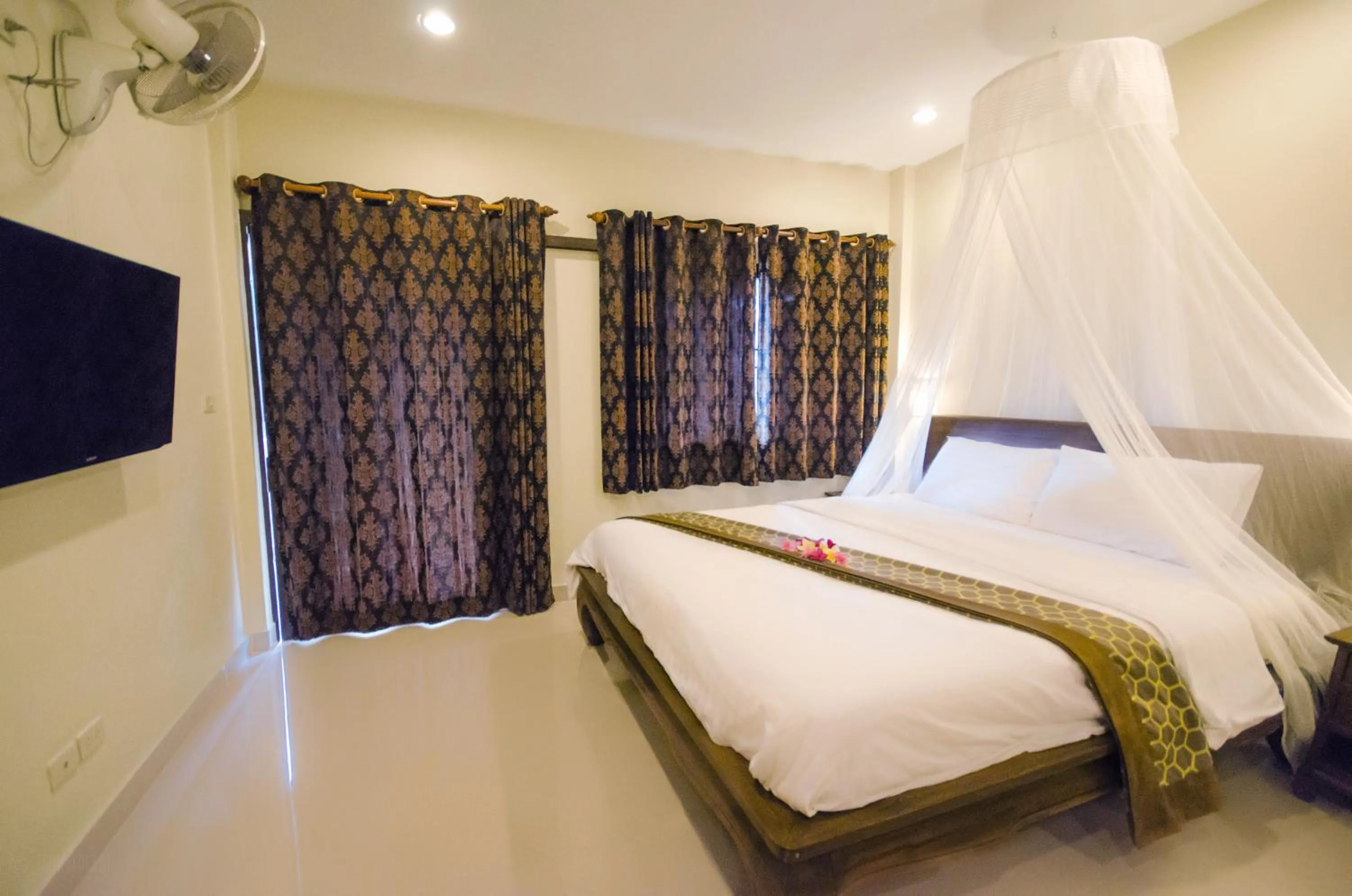 Bed in Namphung Phuket Boutique Resort