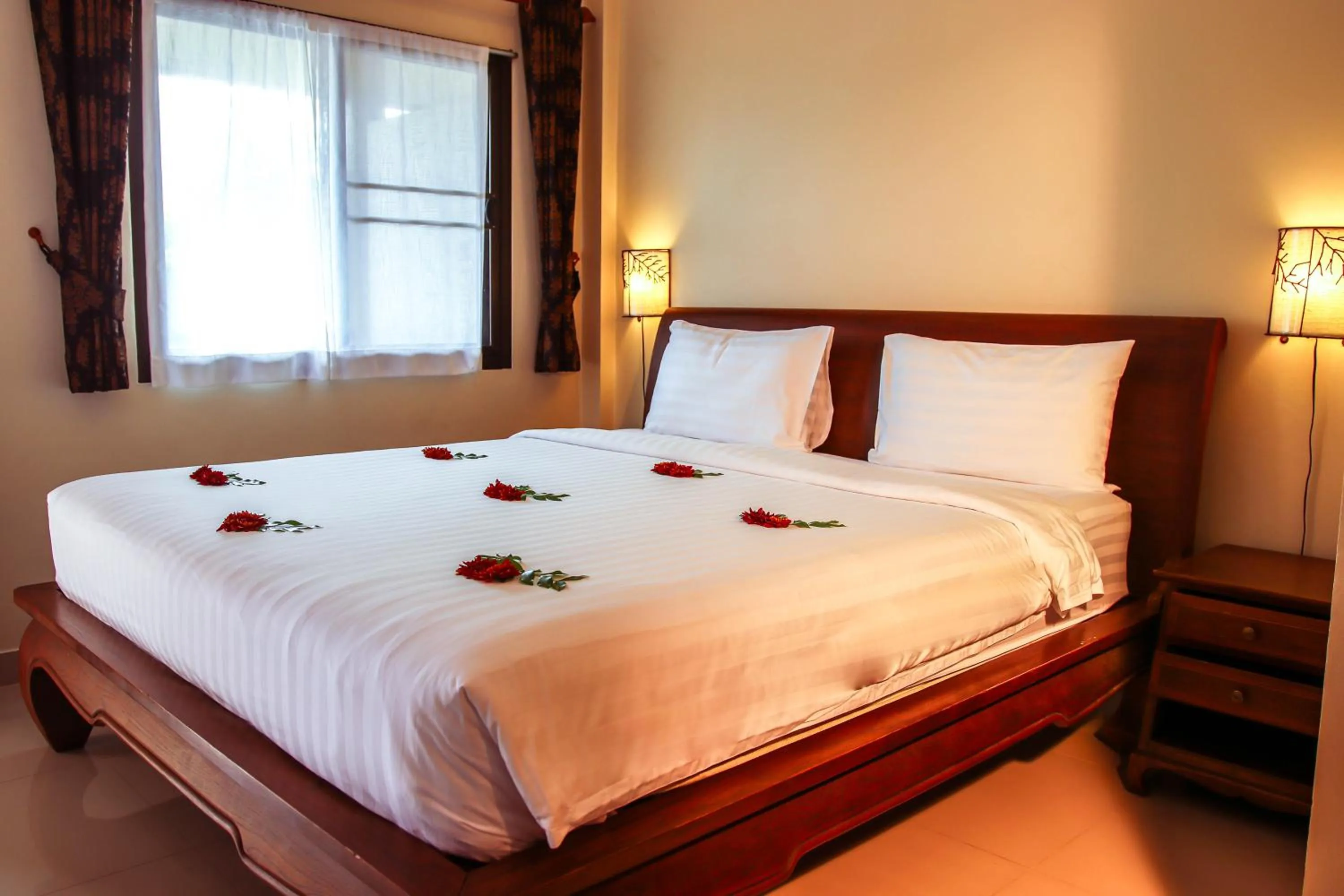 Bed in Namphung Phuket Boutique Resort