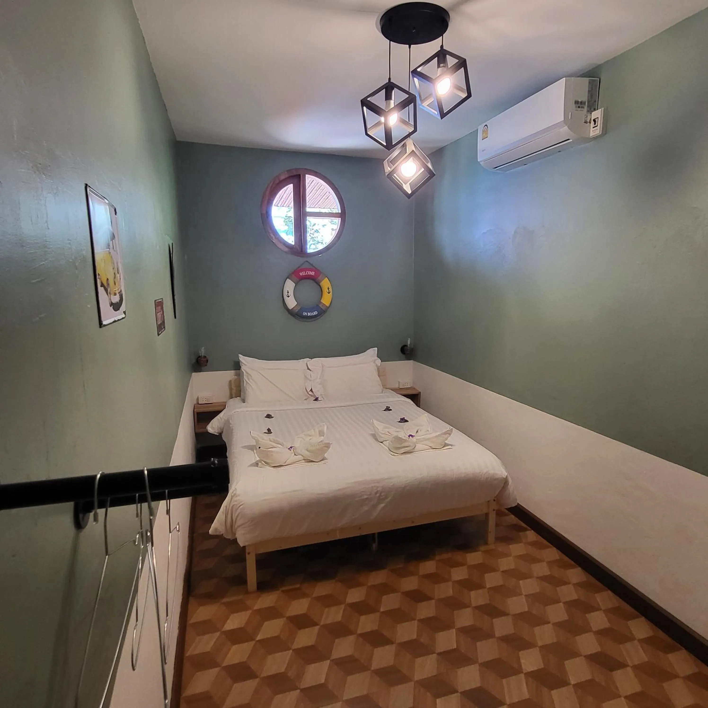 Bed in Namphung Phuket Boutique Resort