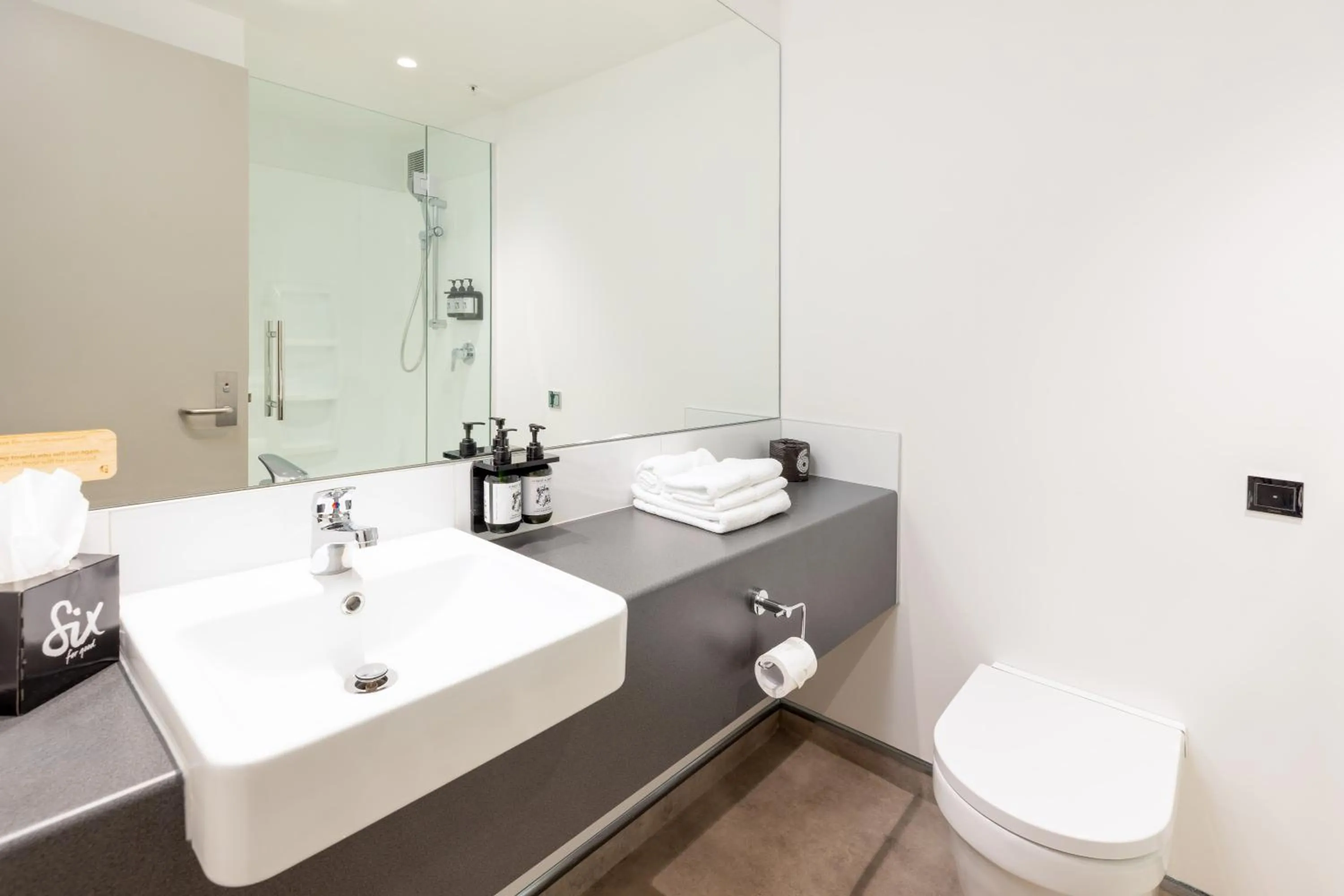 Bathroom in Hotel Give