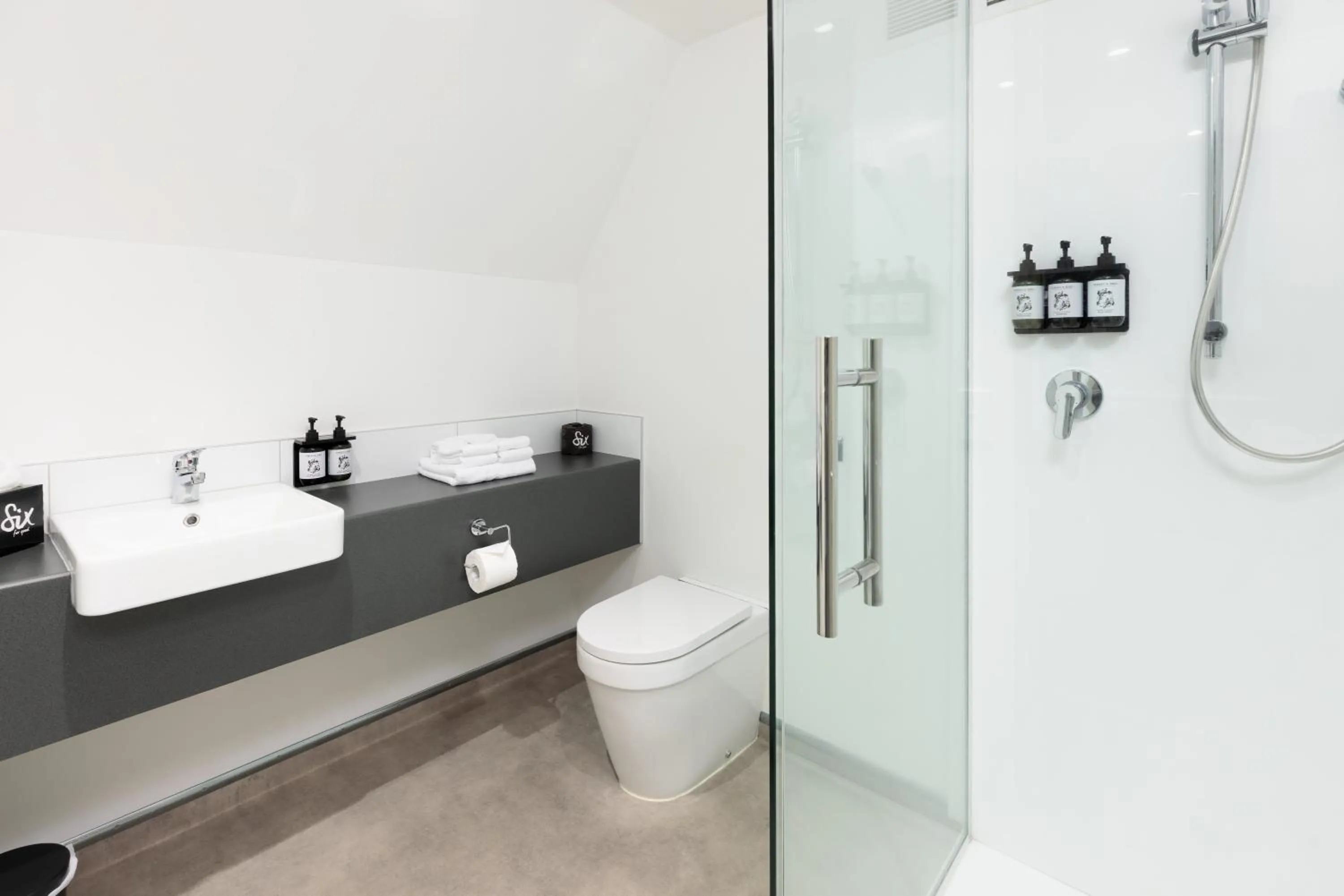 Bathroom in Hotel Give