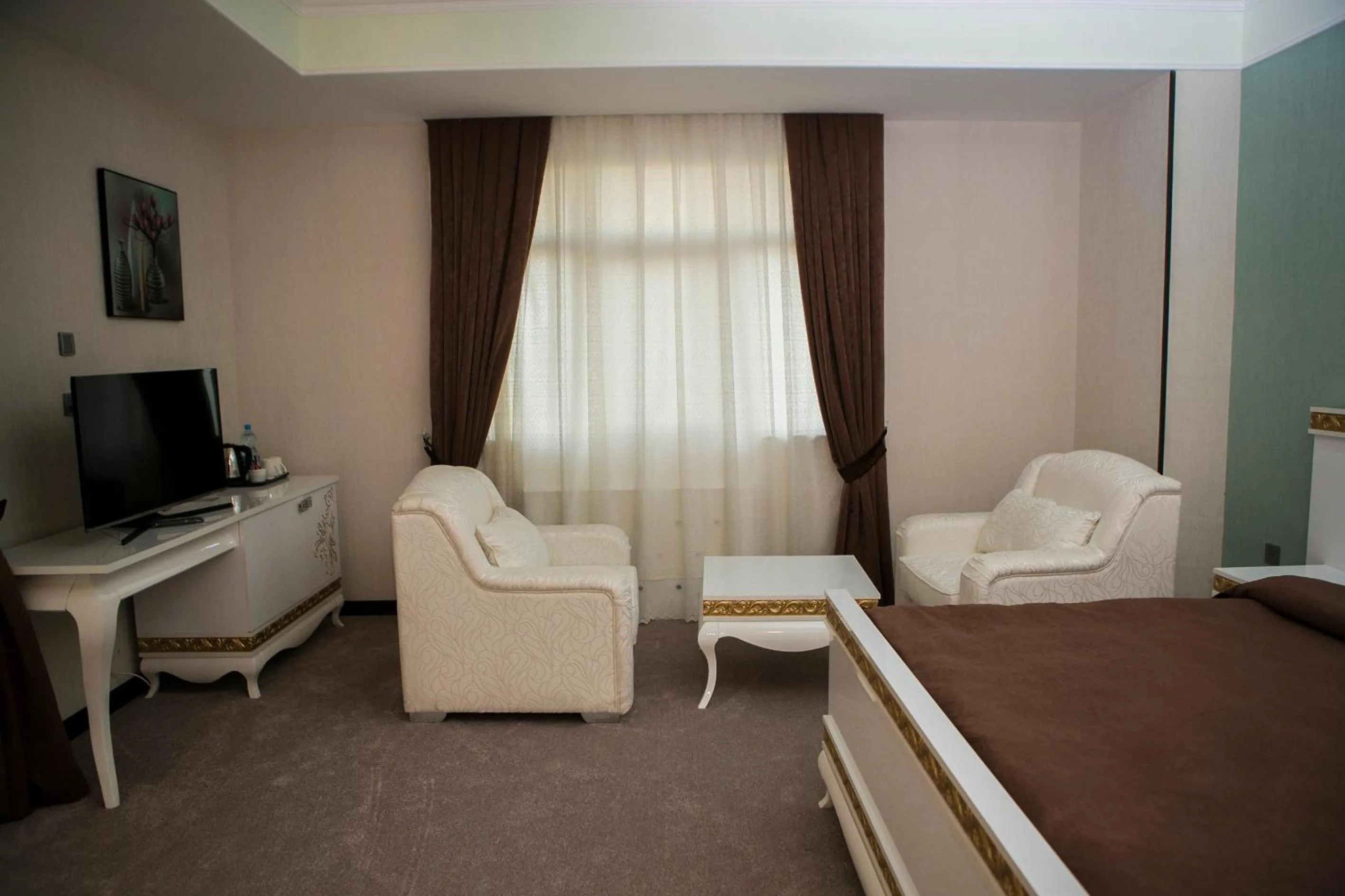 Photo of the whole room in Azalea Hotel Baku