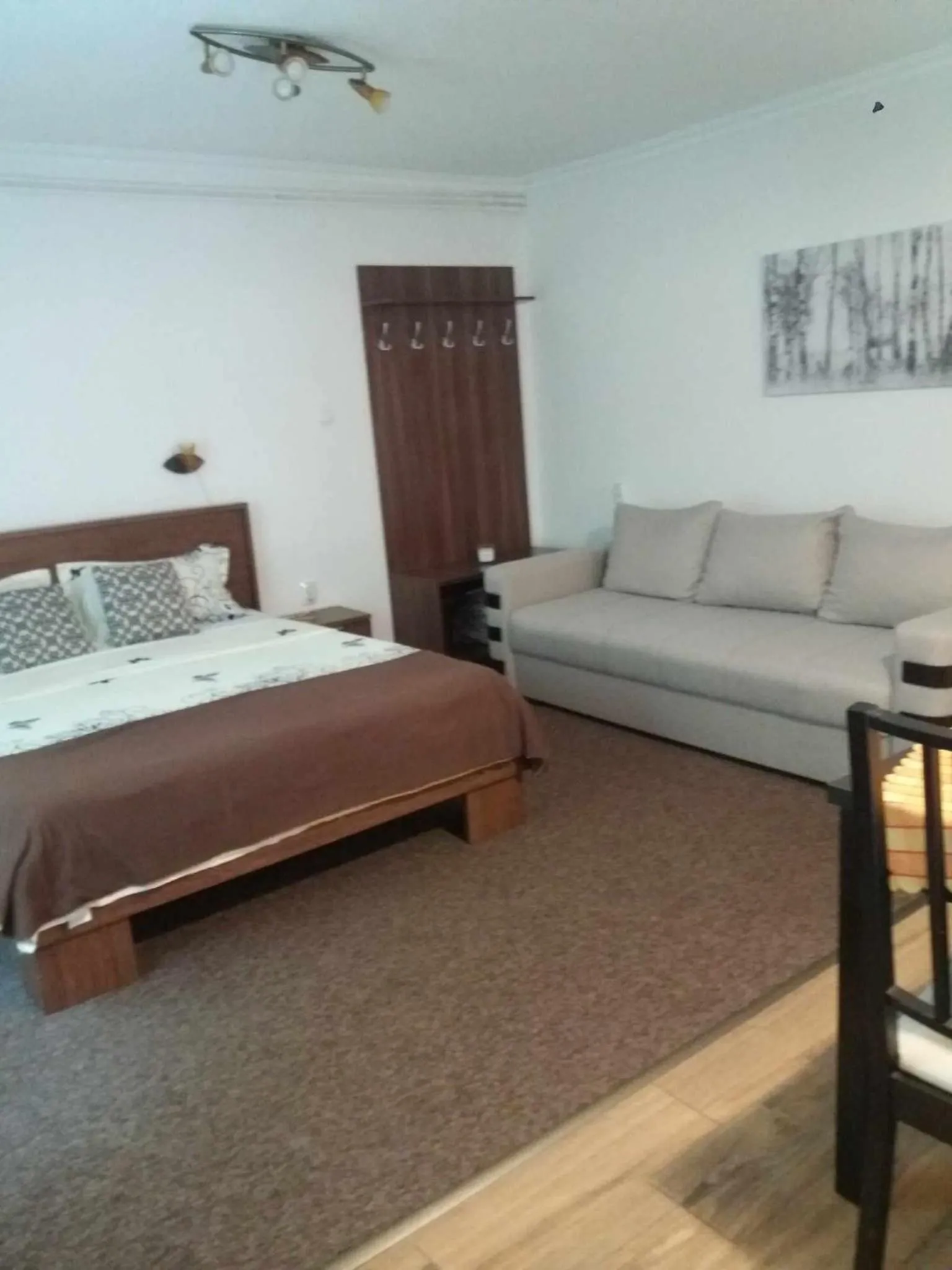 Seating area, Bed in Casa Dora