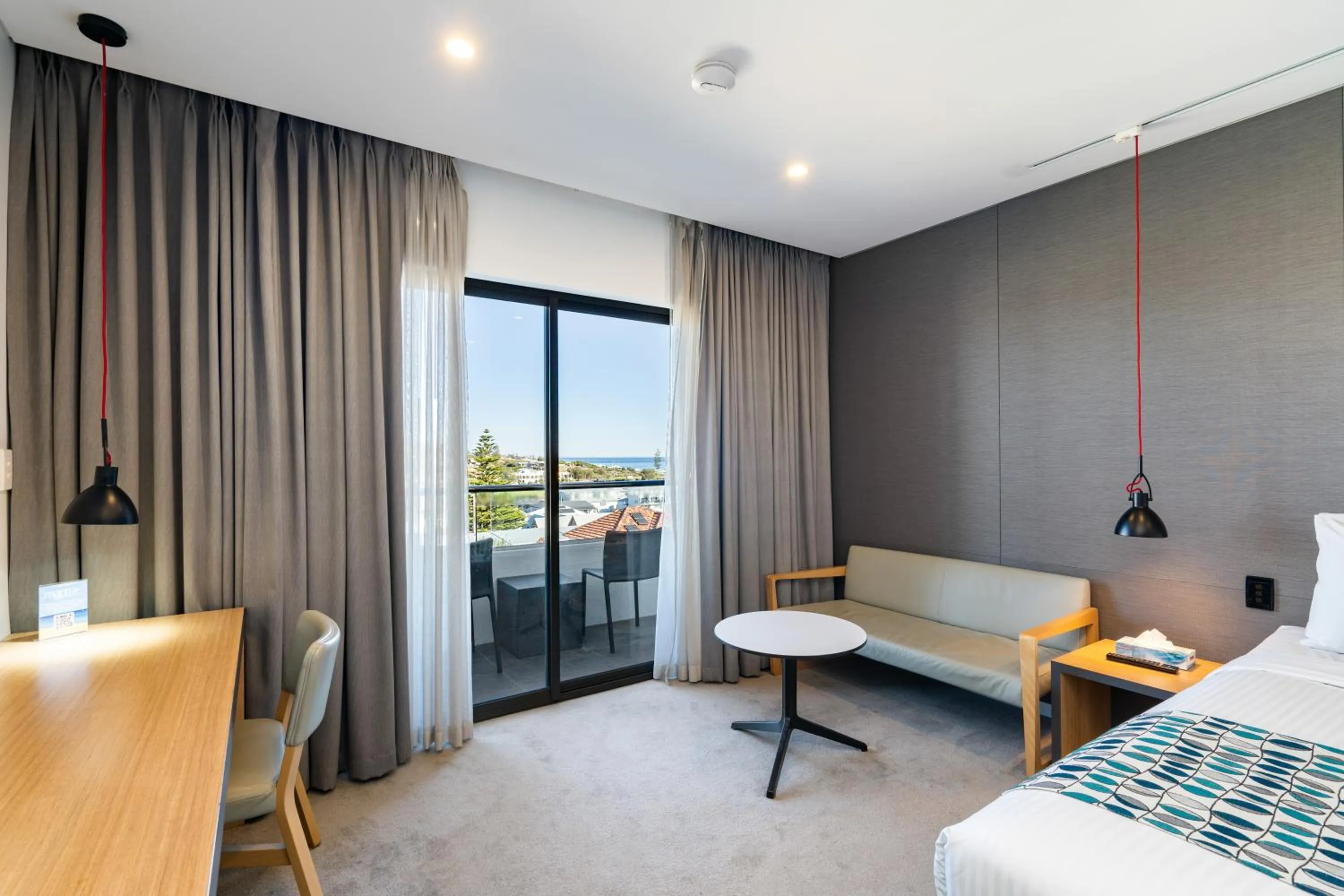 Seating area, Bed in Mantra Bunbury