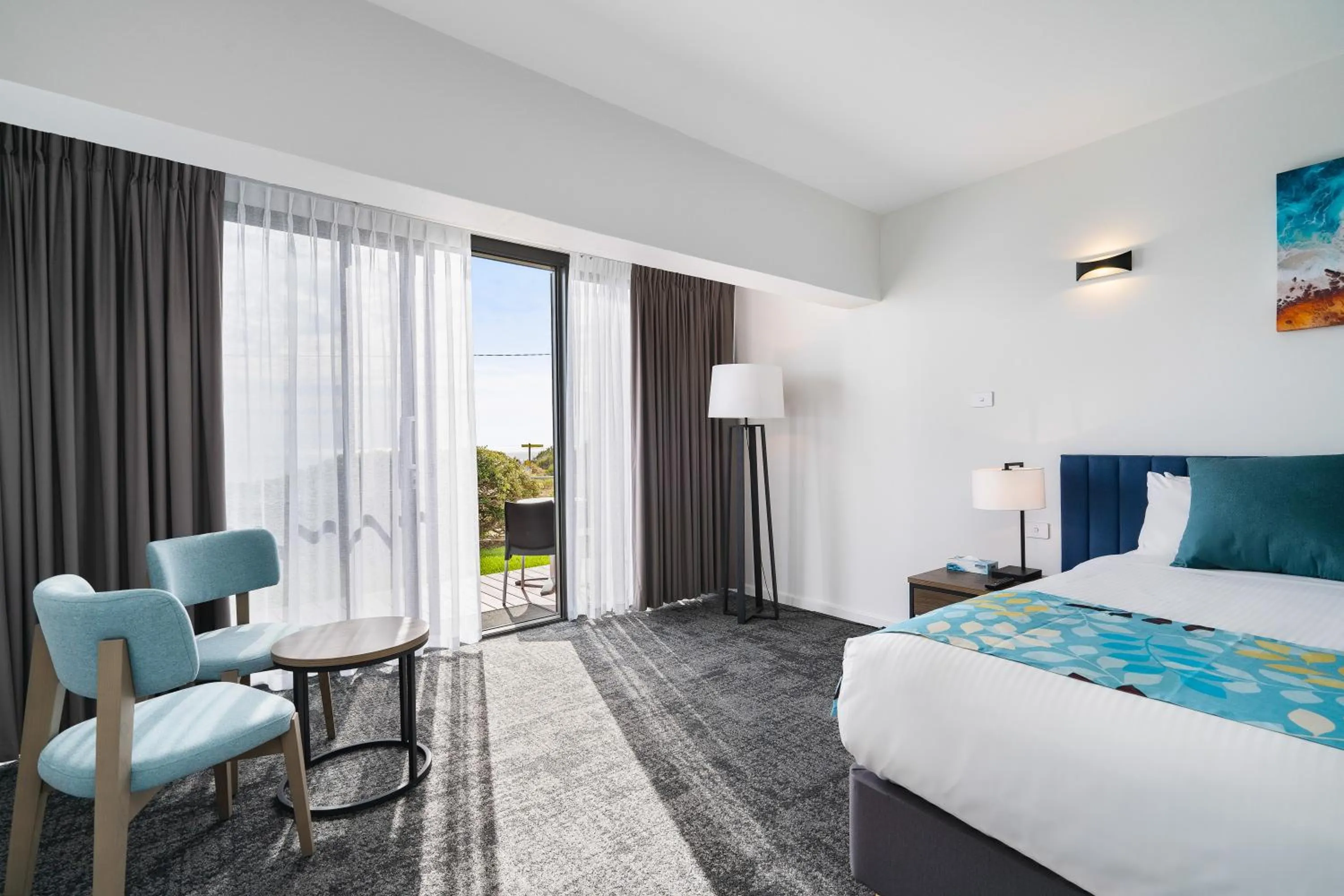 Seating area, Bed in Mantra Bunbury