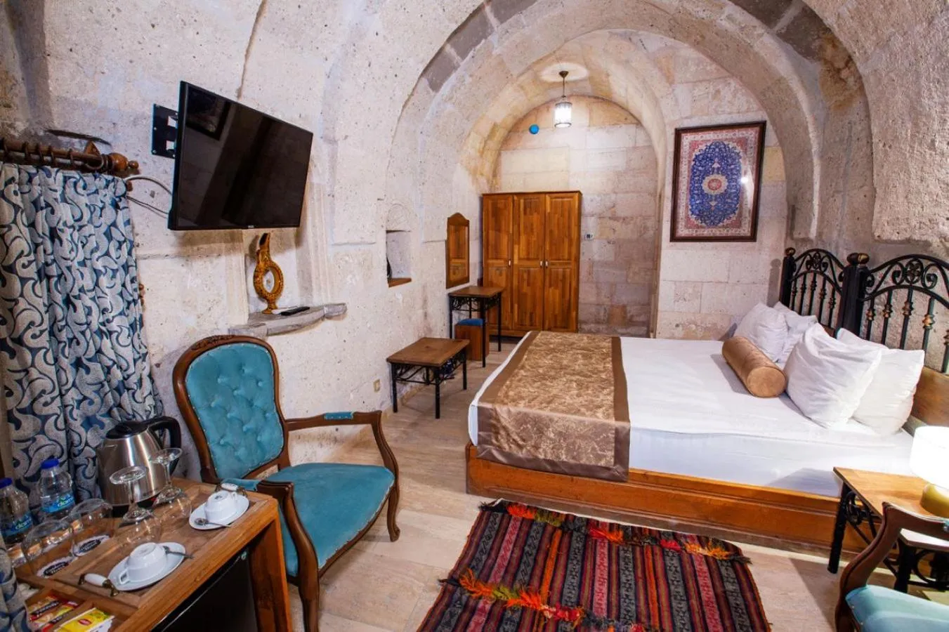 Bed in Caldera Cave Hotel