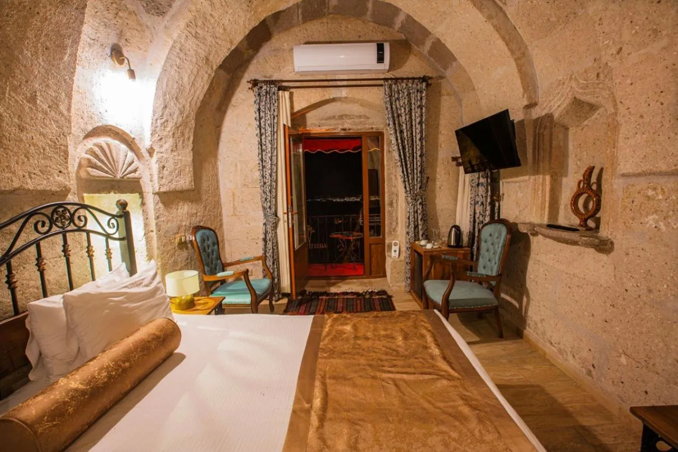 Bed in Caldera Cave Hotel