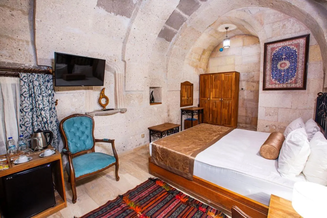 Bed in Caldera Cave Hotel