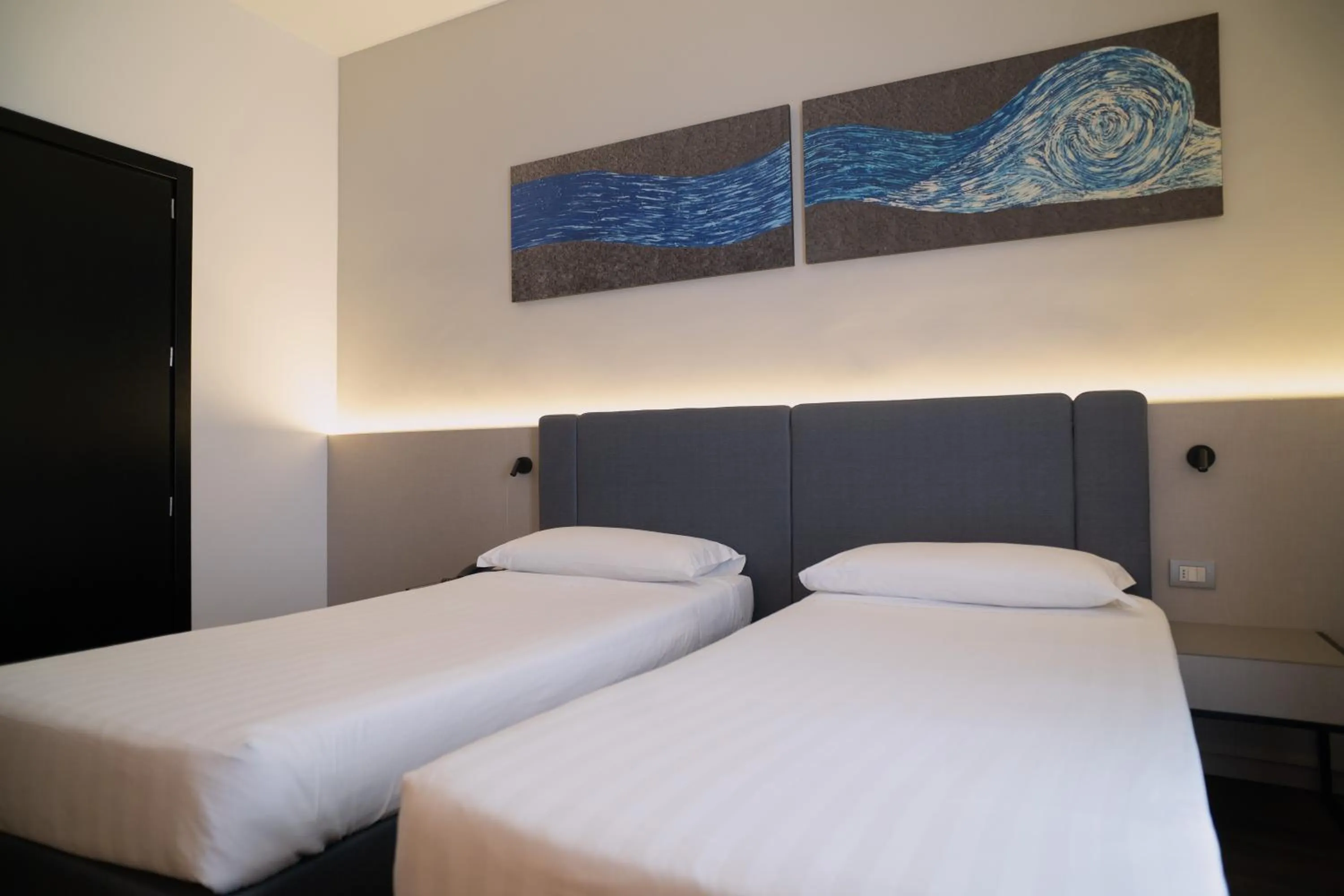 Bed in Sea Lion Hotel