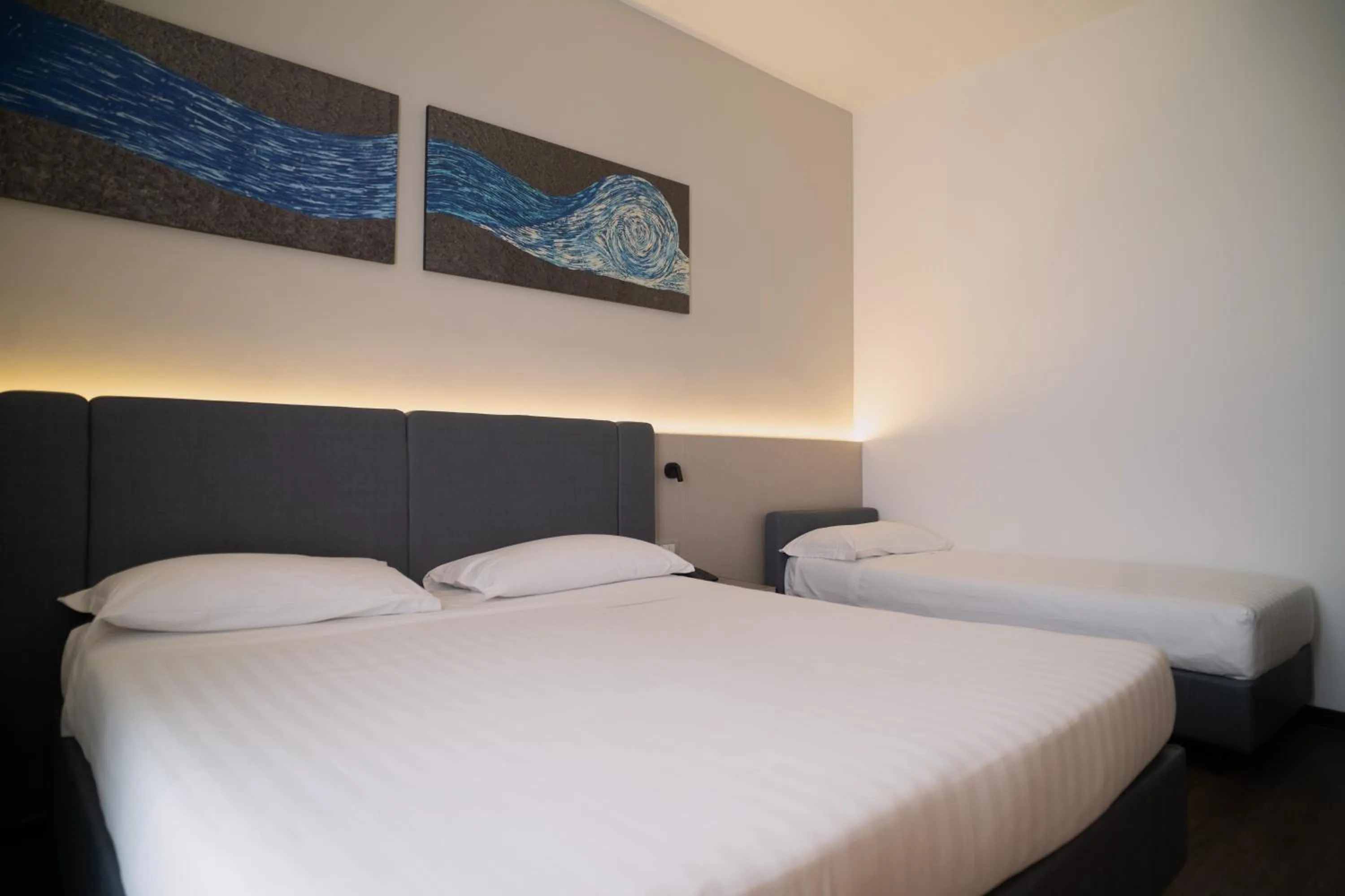 Bed in Sea Lion Hotel