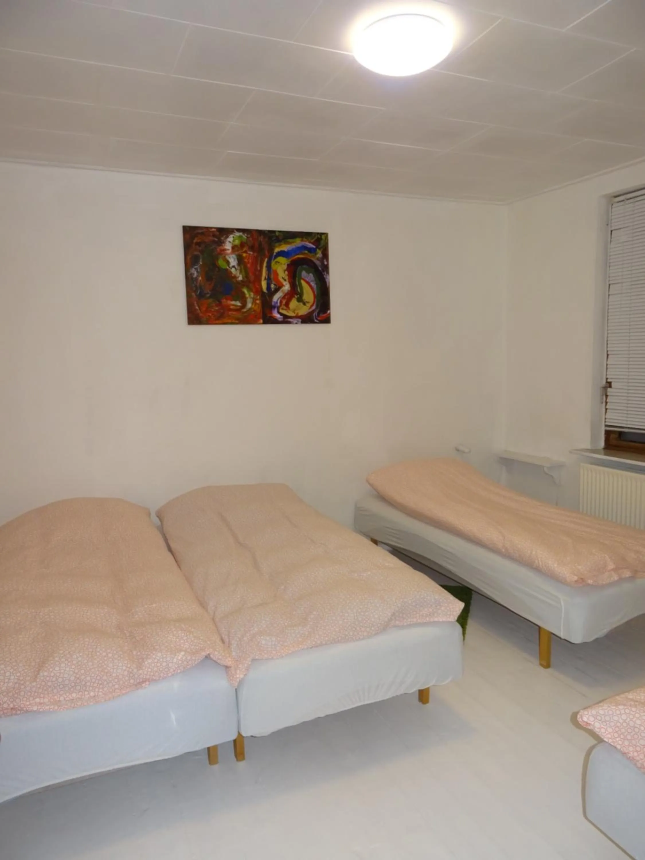 Bedroom in Pasescia Bed and Breakfast.