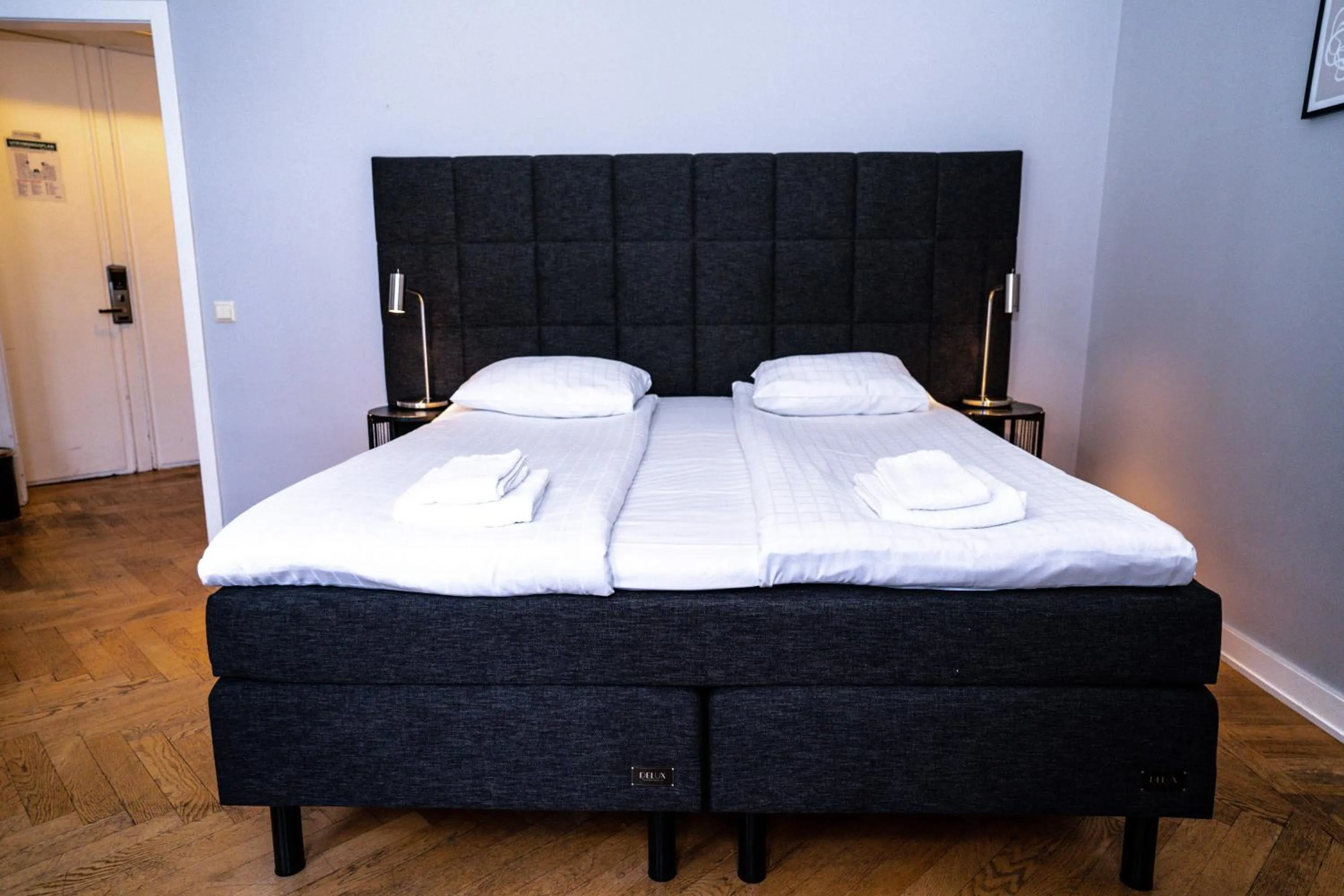 Bed in Queen's Hotel by First Hotels